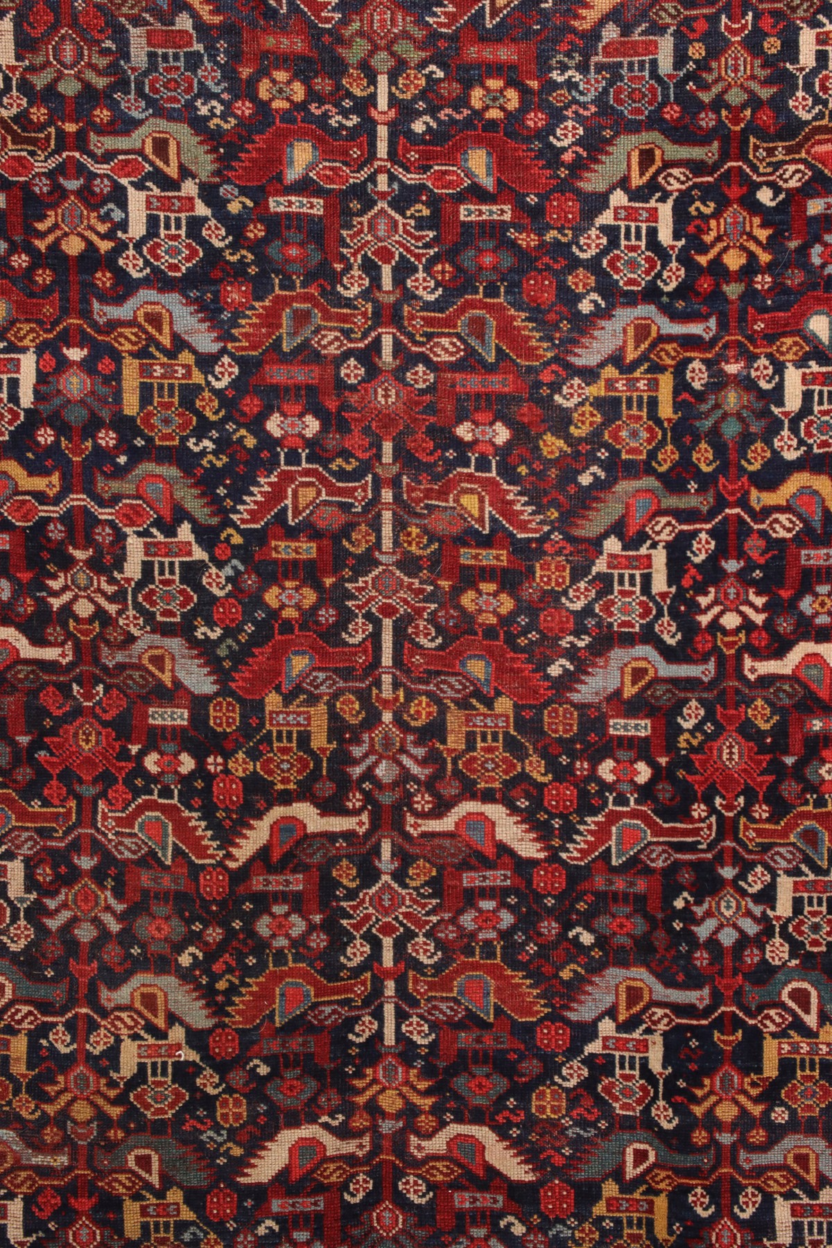 A SOUTHWEST PERSIAN KAMSEH AREA RUG CIRCA 1900