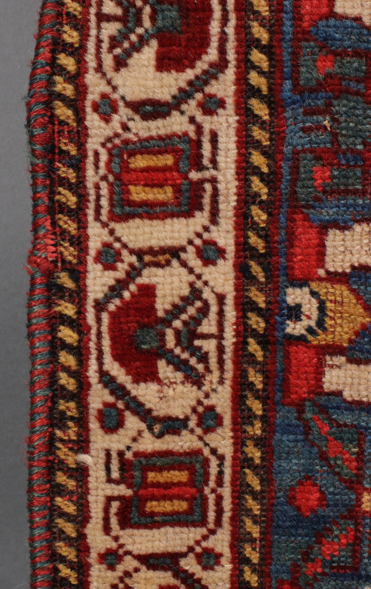 A SOUTHWEST PERSIAN KAMSEH AREA RUG CIRCA 1900