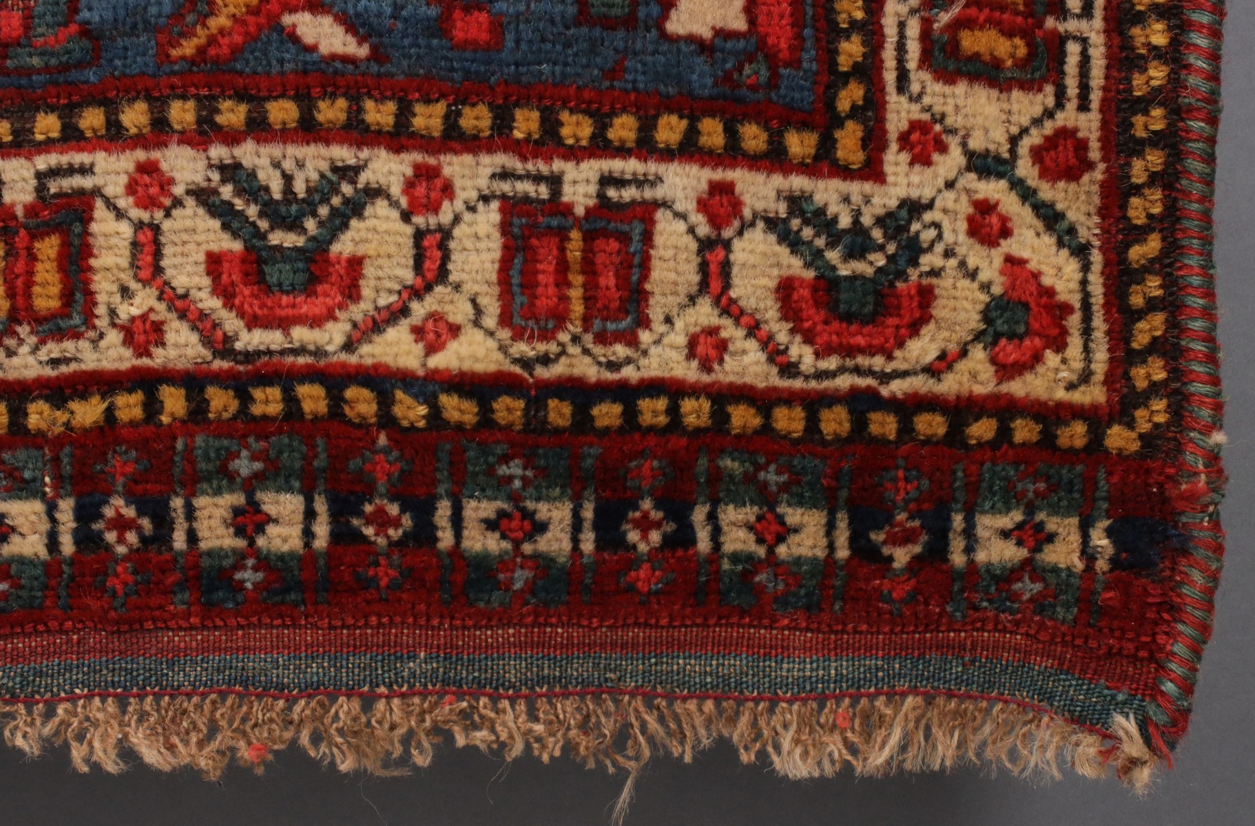 A SOUTHWEST PERSIAN KAMSEH AREA RUG CIRCA 1900