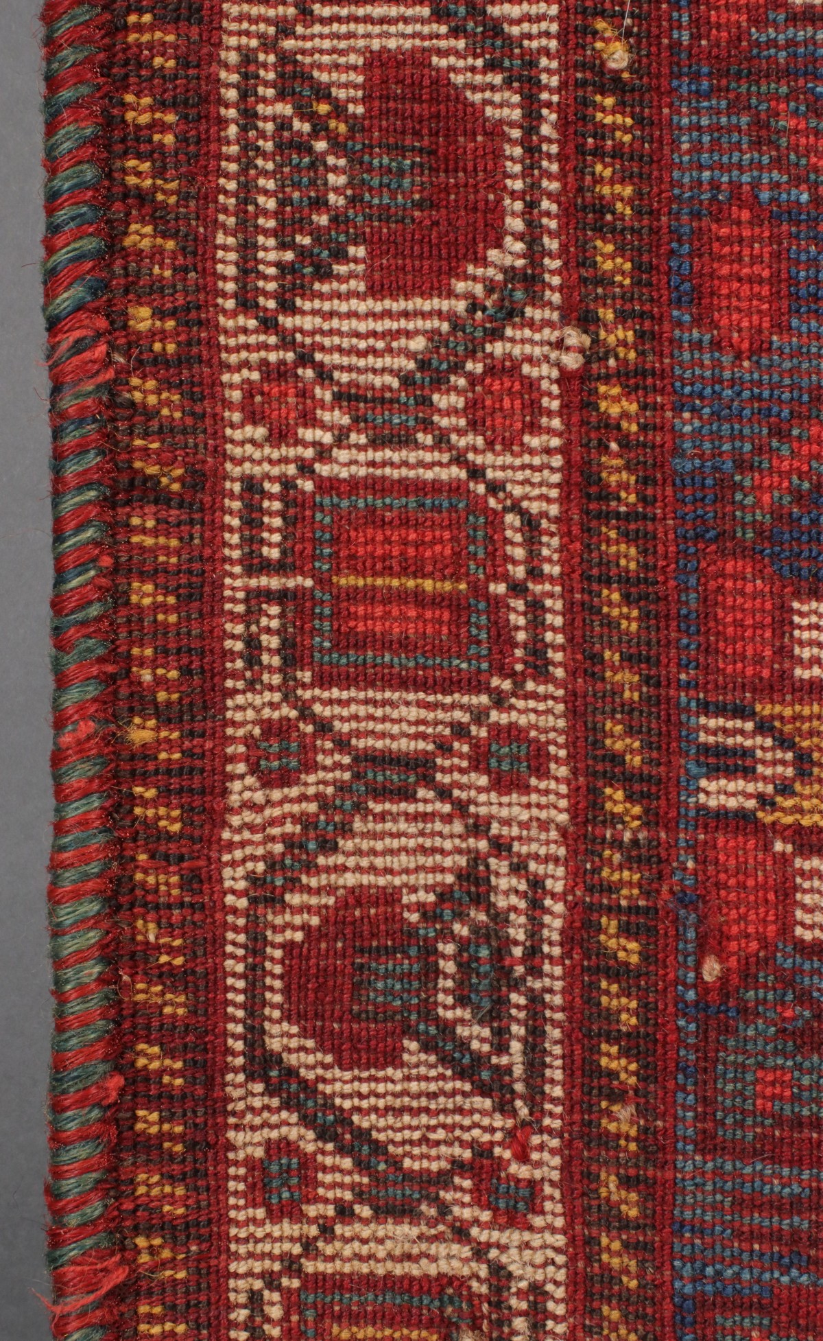 A SOUTHWEST PERSIAN KAMSEH AREA RUG CIRCA 1900