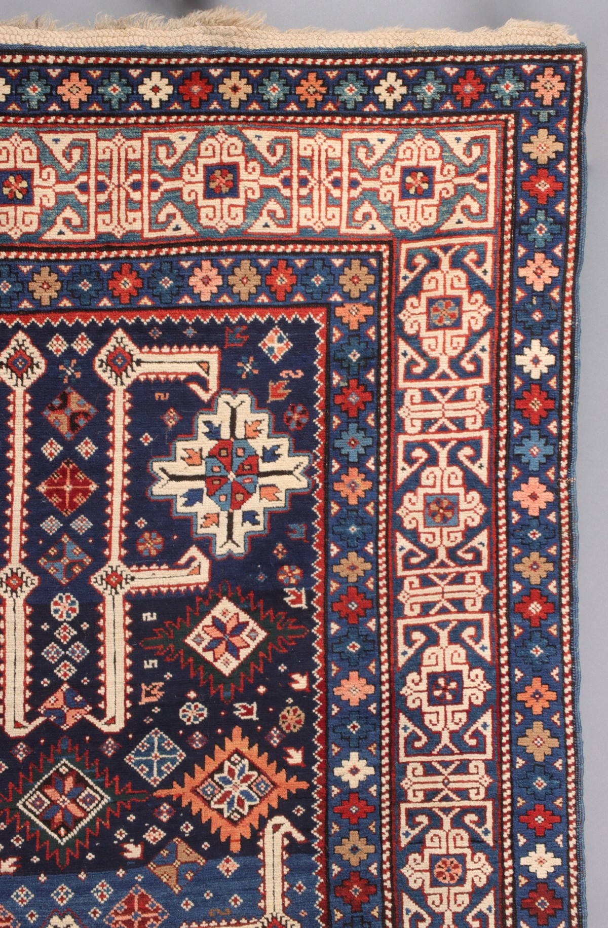 AN ANTIQUE KUBA CAUCASIAN SCATTER RUG CIRCA 1890