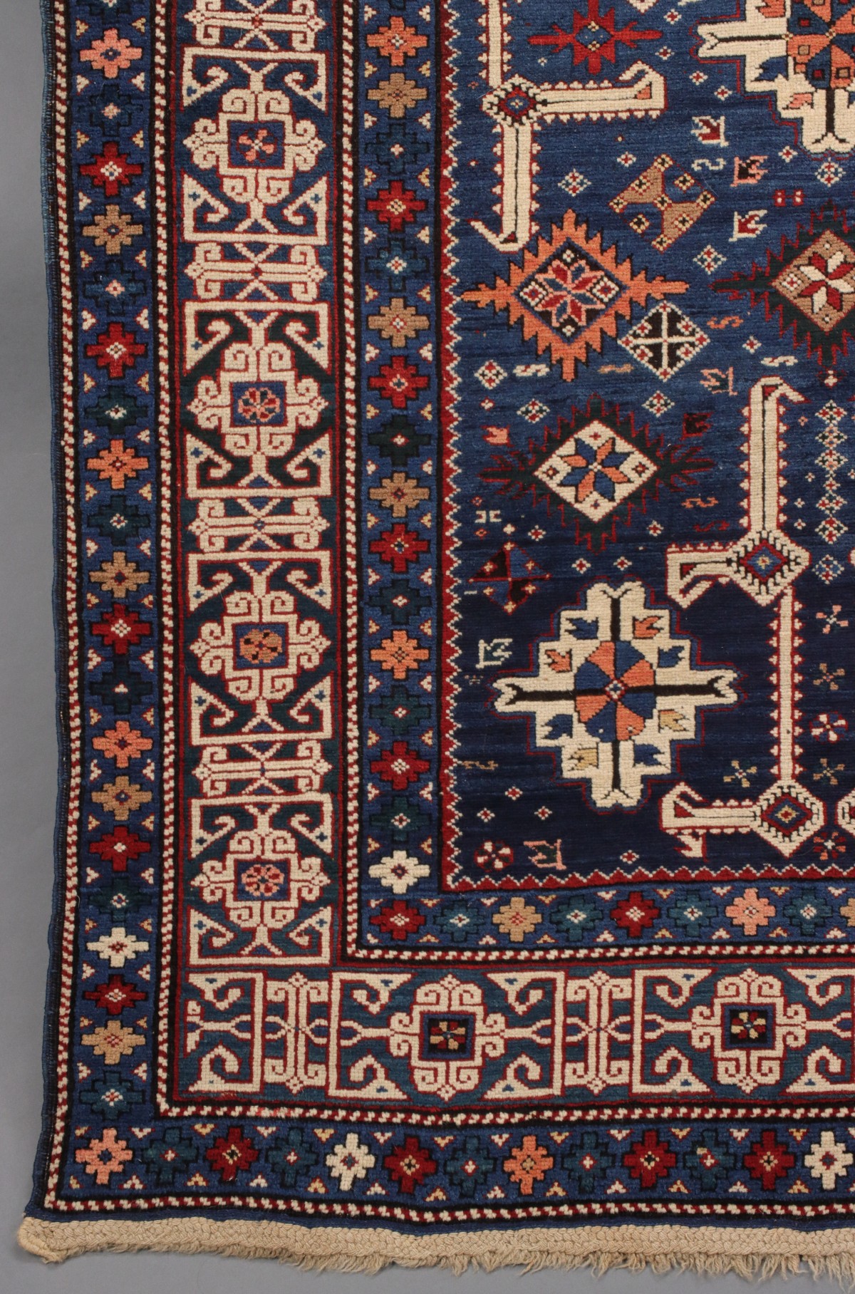 AN ANTIQUE KUBA CAUCASIAN SCATTER RUG CIRCA 1890