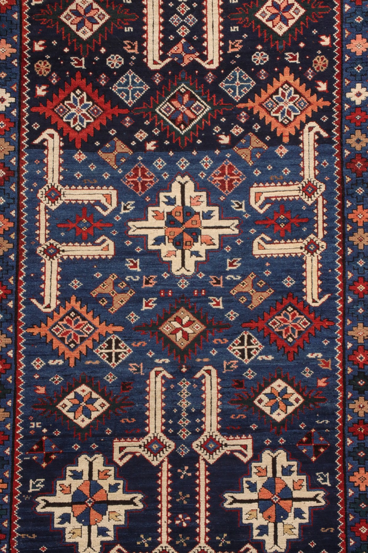 AN ANTIQUE KUBA CAUCASIAN SCATTER RUG CIRCA 1890