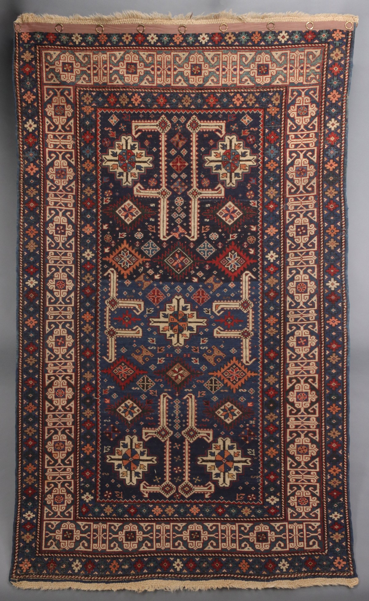 AN ANTIQUE KUBA CAUCASIAN SCATTER RUG CIRCA 1890