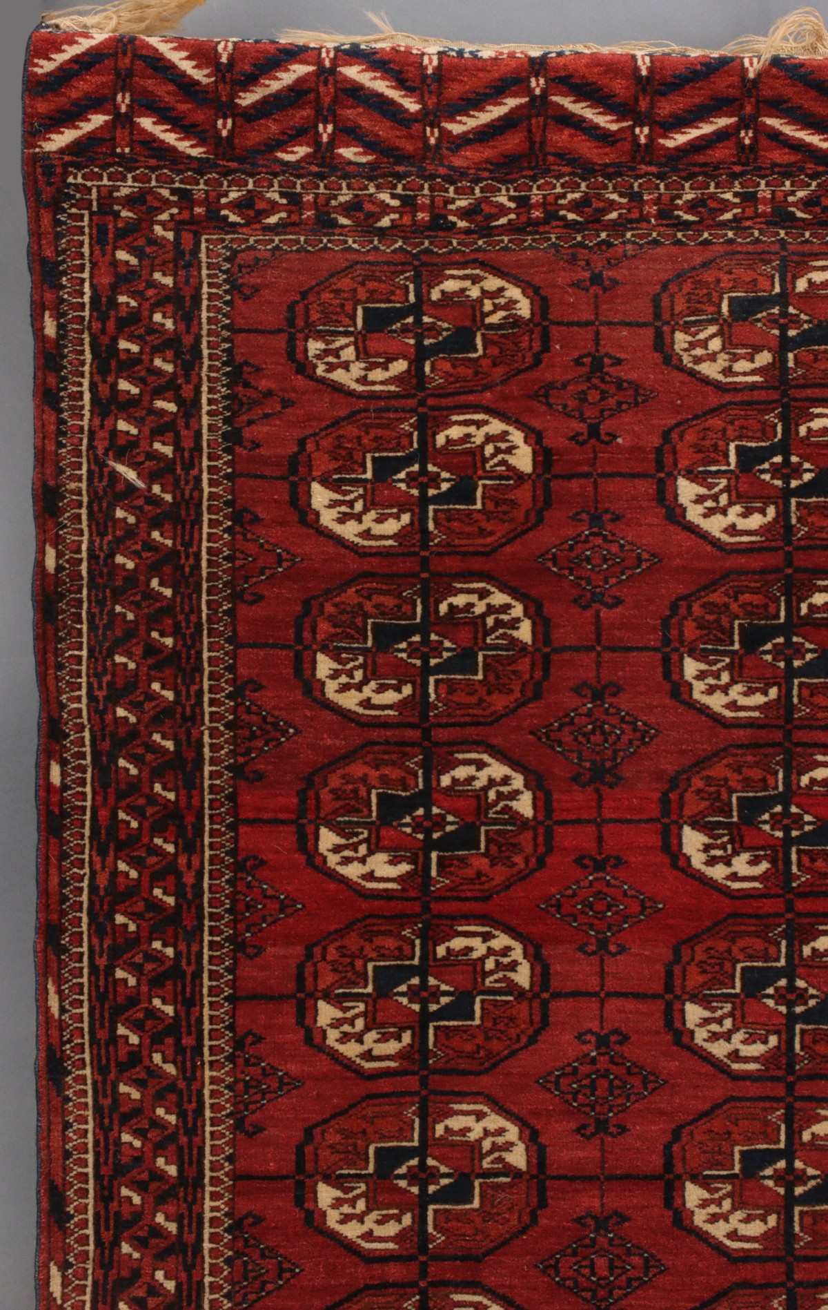 A WEST TURKESTAN TEKKE SCATTER RUG CIRCA 1910