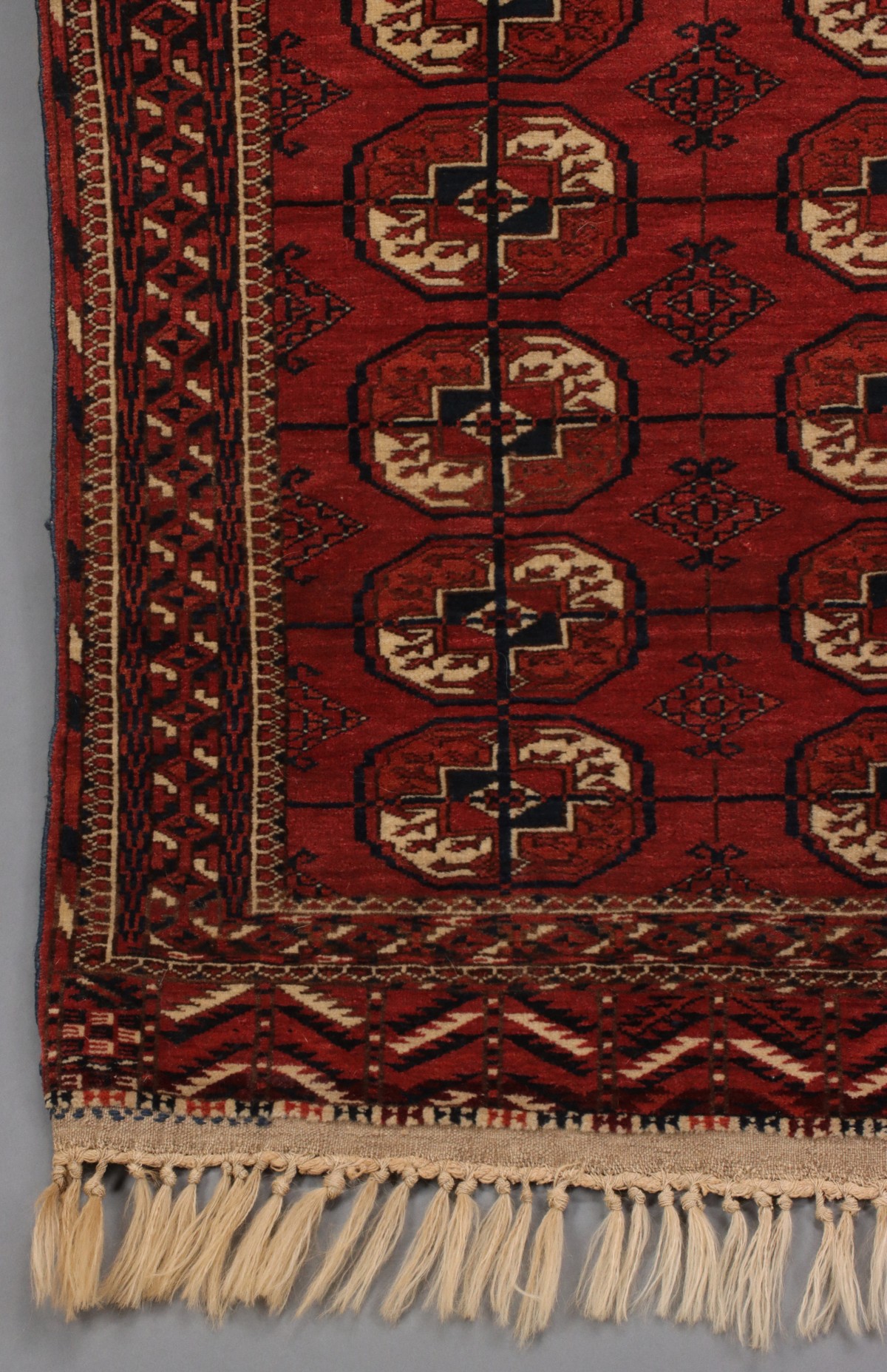 A WEST TURKESTAN TEKKE SCATTER RUG CIRCA 1910