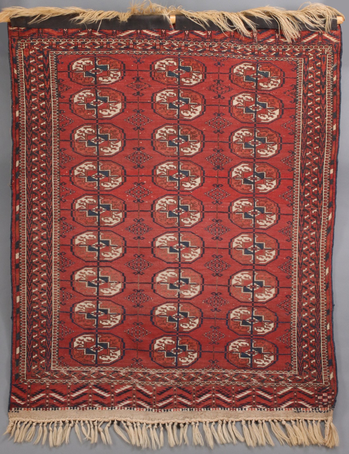 A WEST TURKESTAN TEKKE SCATTER RUG CIRCA 1910