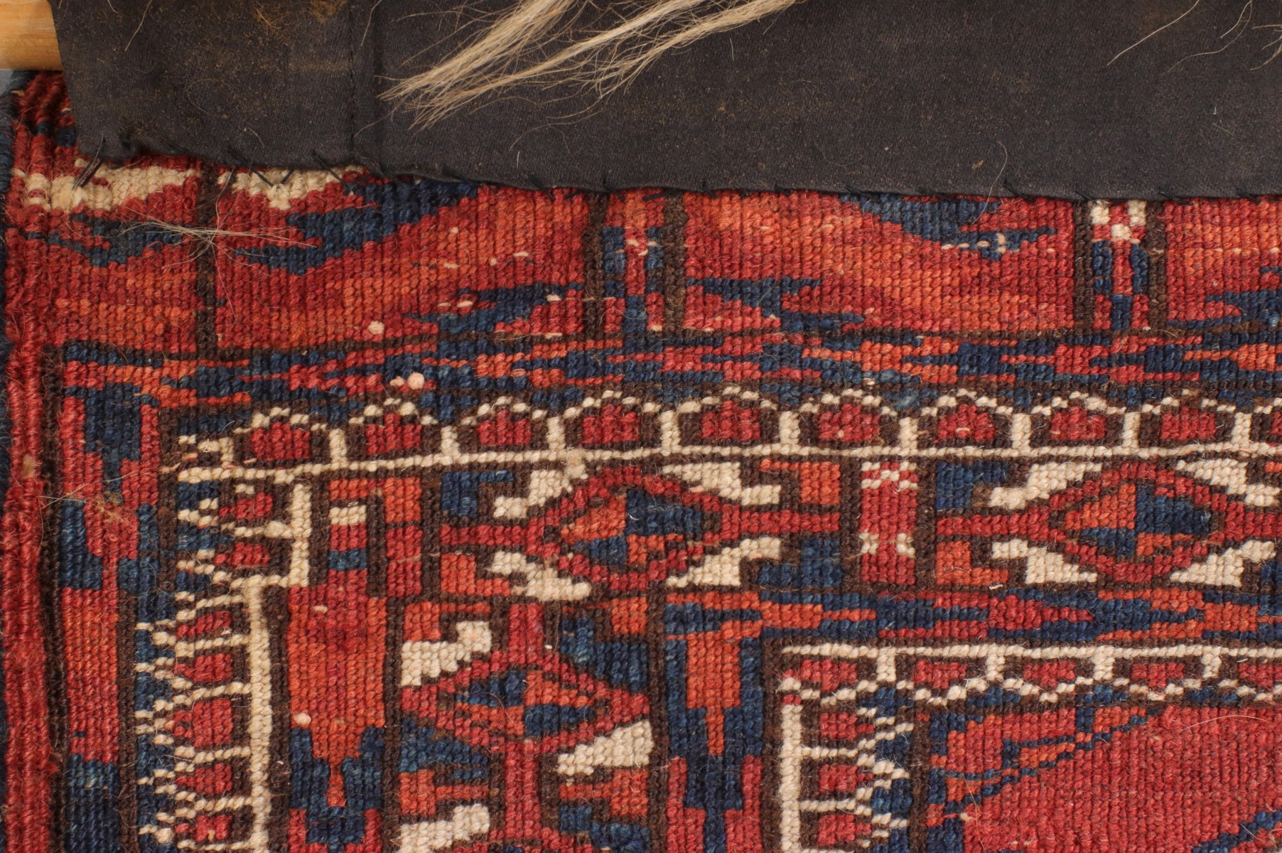 A WEST TURKESTAN TEKKE SCATTER RUG CIRCA 1910