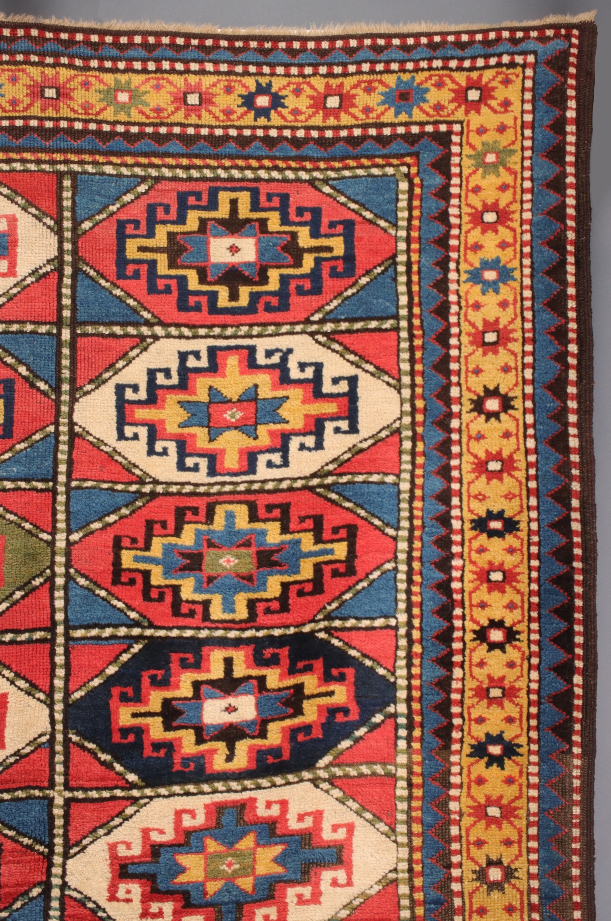 AN ANTIQUE MOGHAN CAUCASIAN LONG RUN CARPET CIRCA 1890