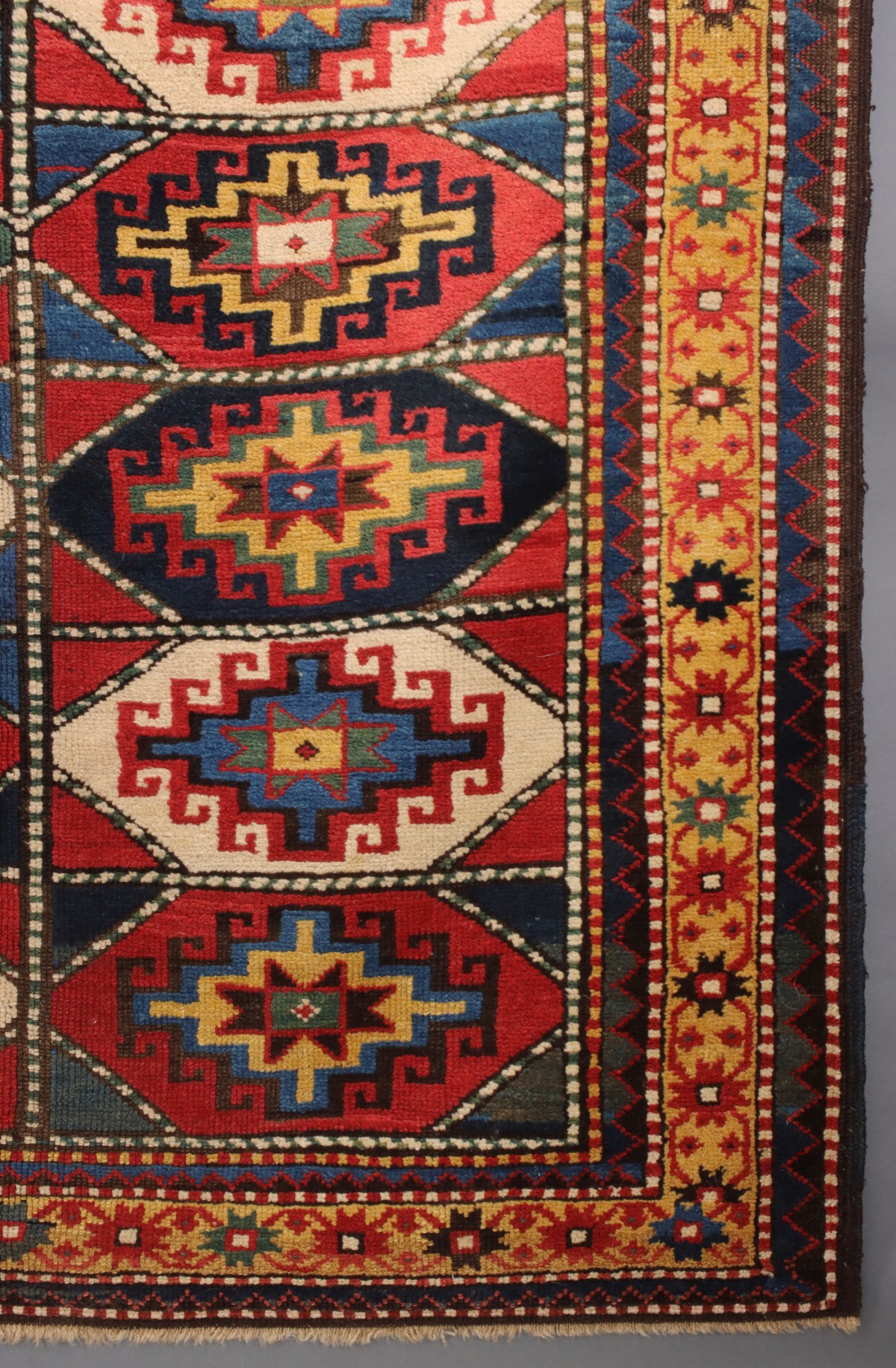 AN ANTIQUE MOGHAN CAUCASIAN LONG RUN CARPET CIRCA 1890