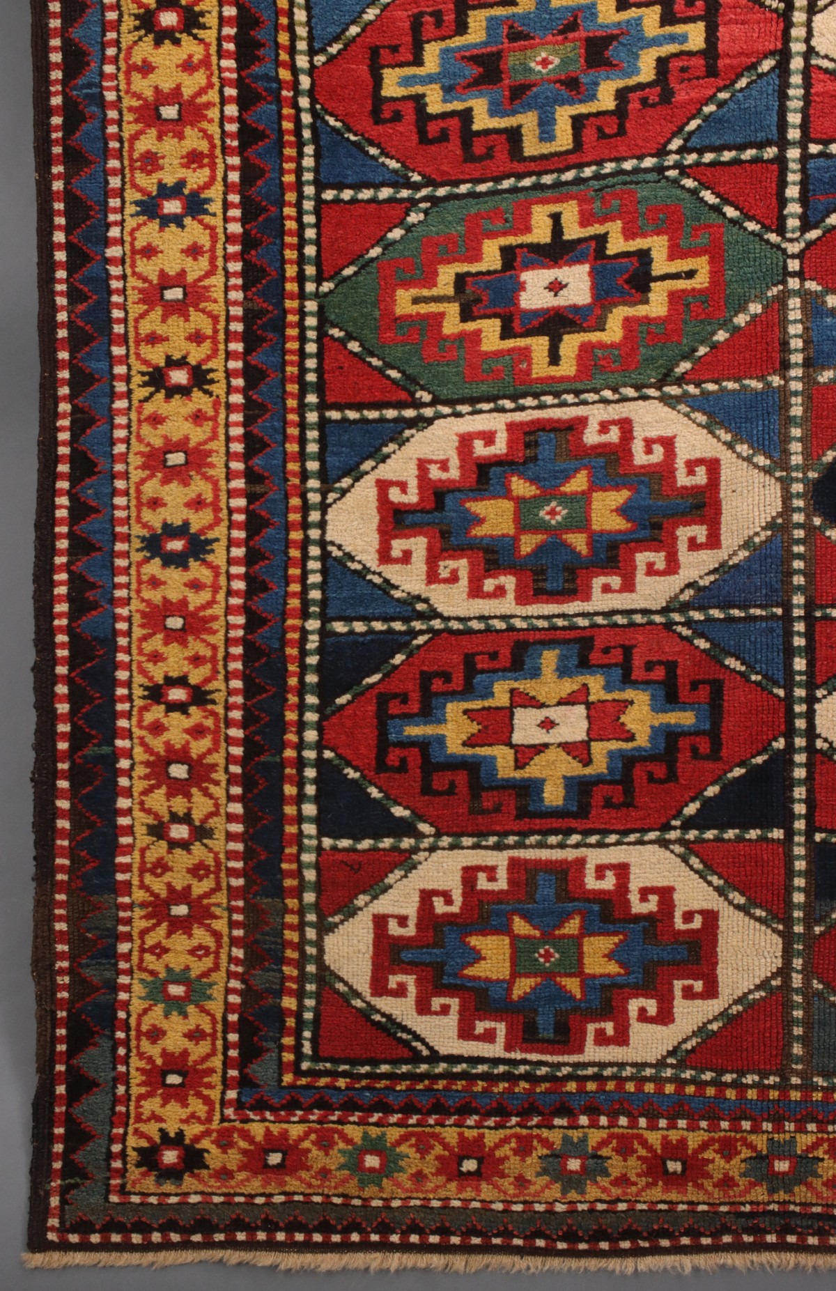 AN ANTIQUE MOGHAN CAUCASIAN LONG RUN CARPET CIRCA 1890