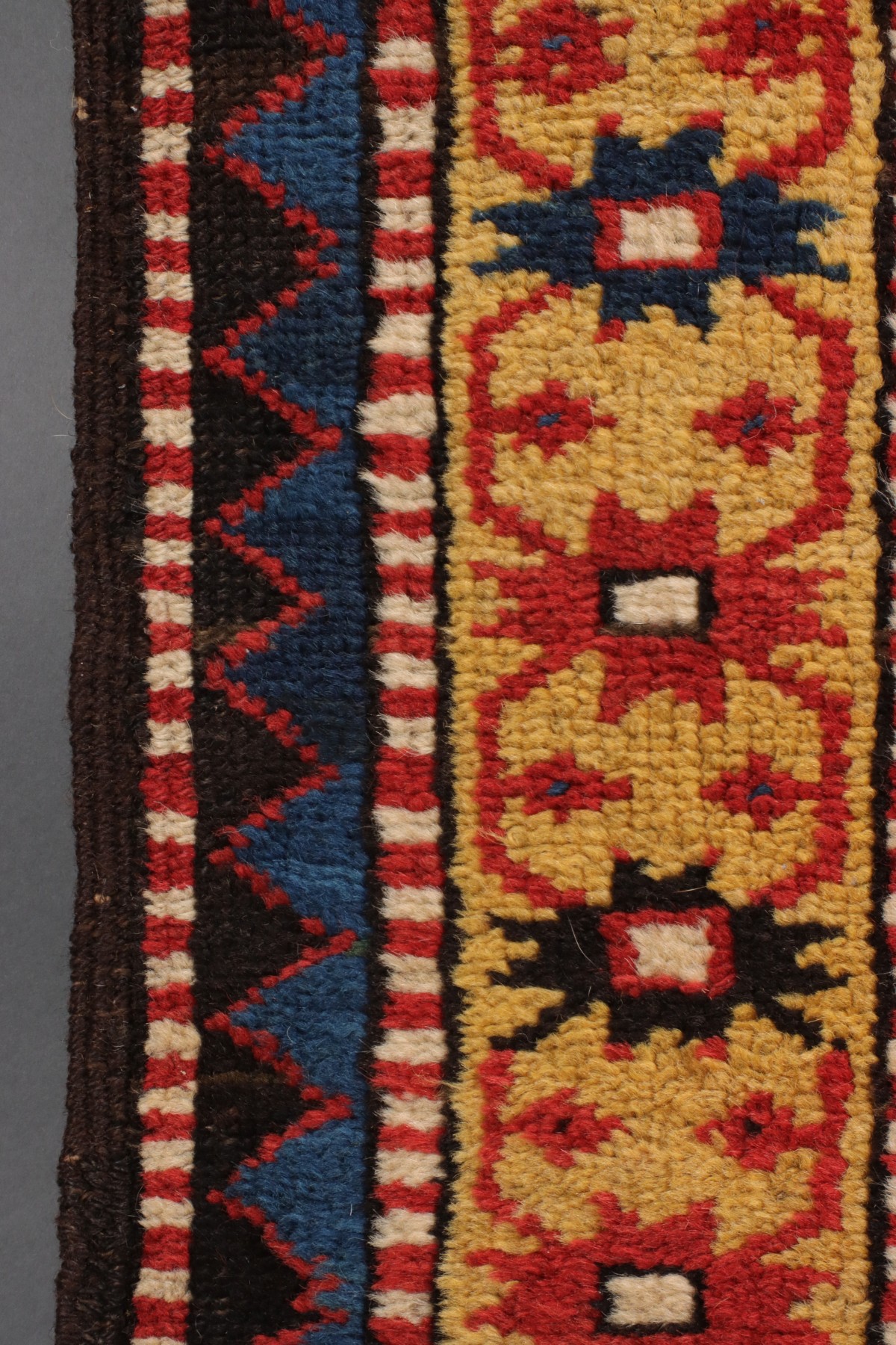 AN ANTIQUE MOGHAN CAUCASIAN LONG RUN CARPET CIRCA 1890