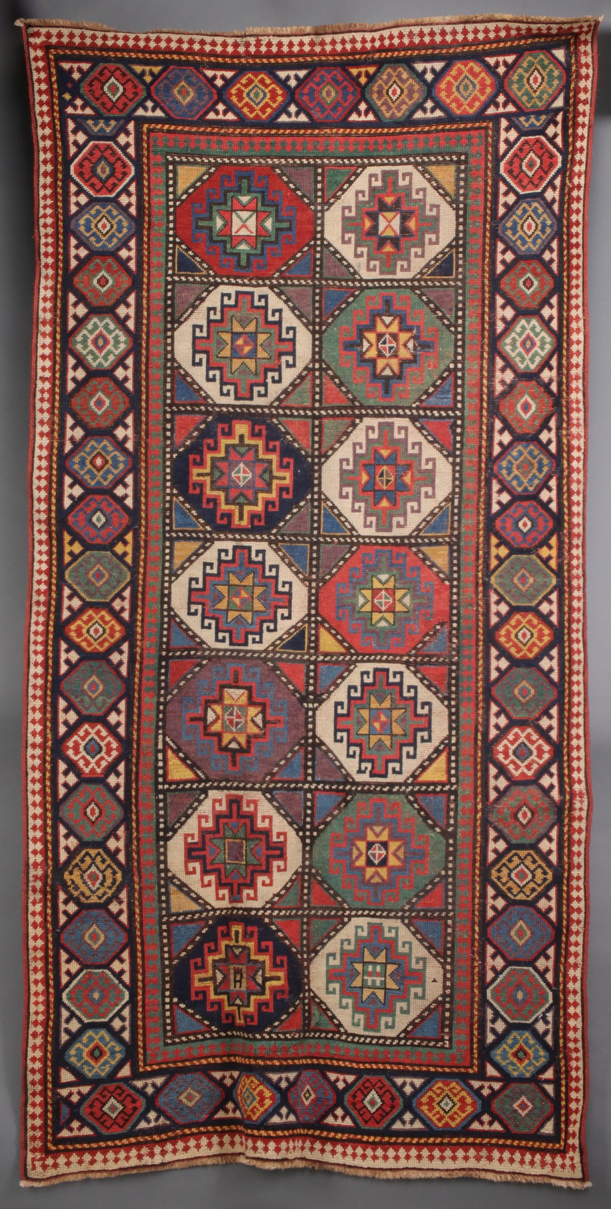 AN ANTIQUE MOGHAN CAUCASIAN LONG RUN CARPET CIRCA 1880