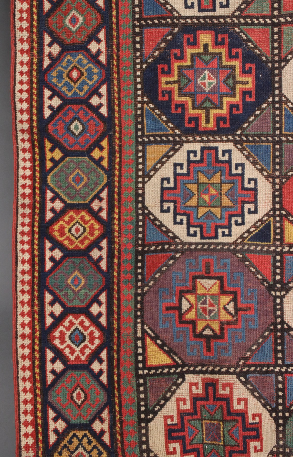 AN ANTIQUE MOGHAN CAUCASIAN LONG RUN CARPET CIRCA 1880