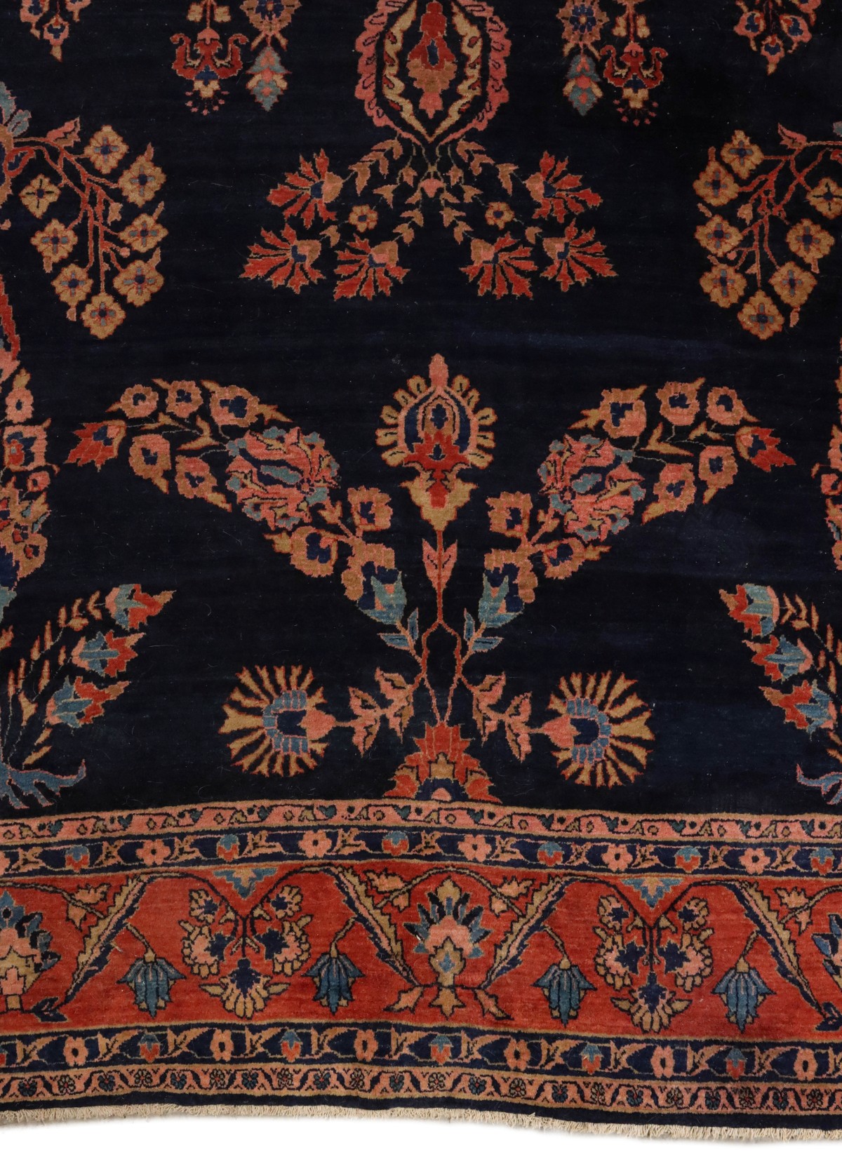 A SPACIOUS JEWEL TONE SAROUK CARPET CIRCA 1910