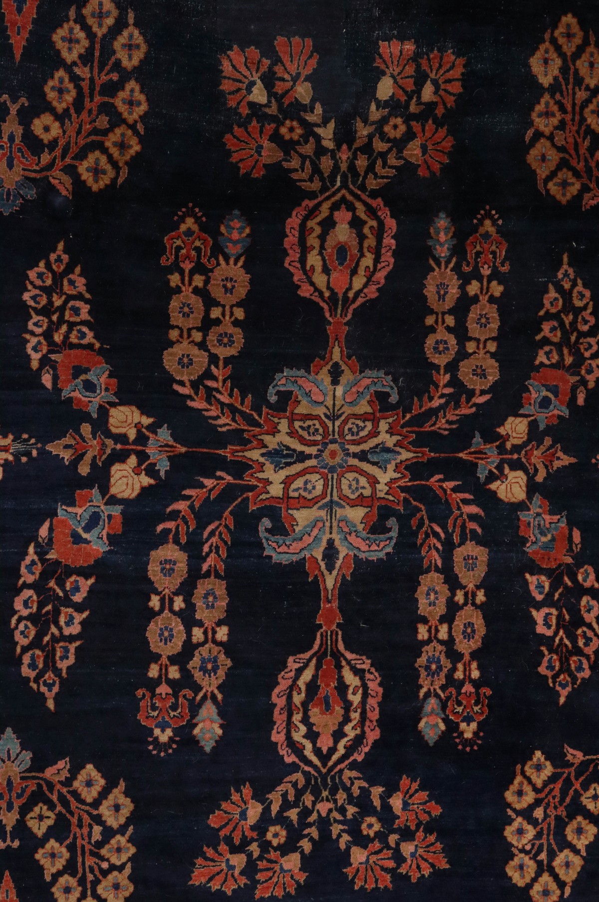 A SPACIOUS JEWEL TONE SAROUK CARPET CIRCA 1910