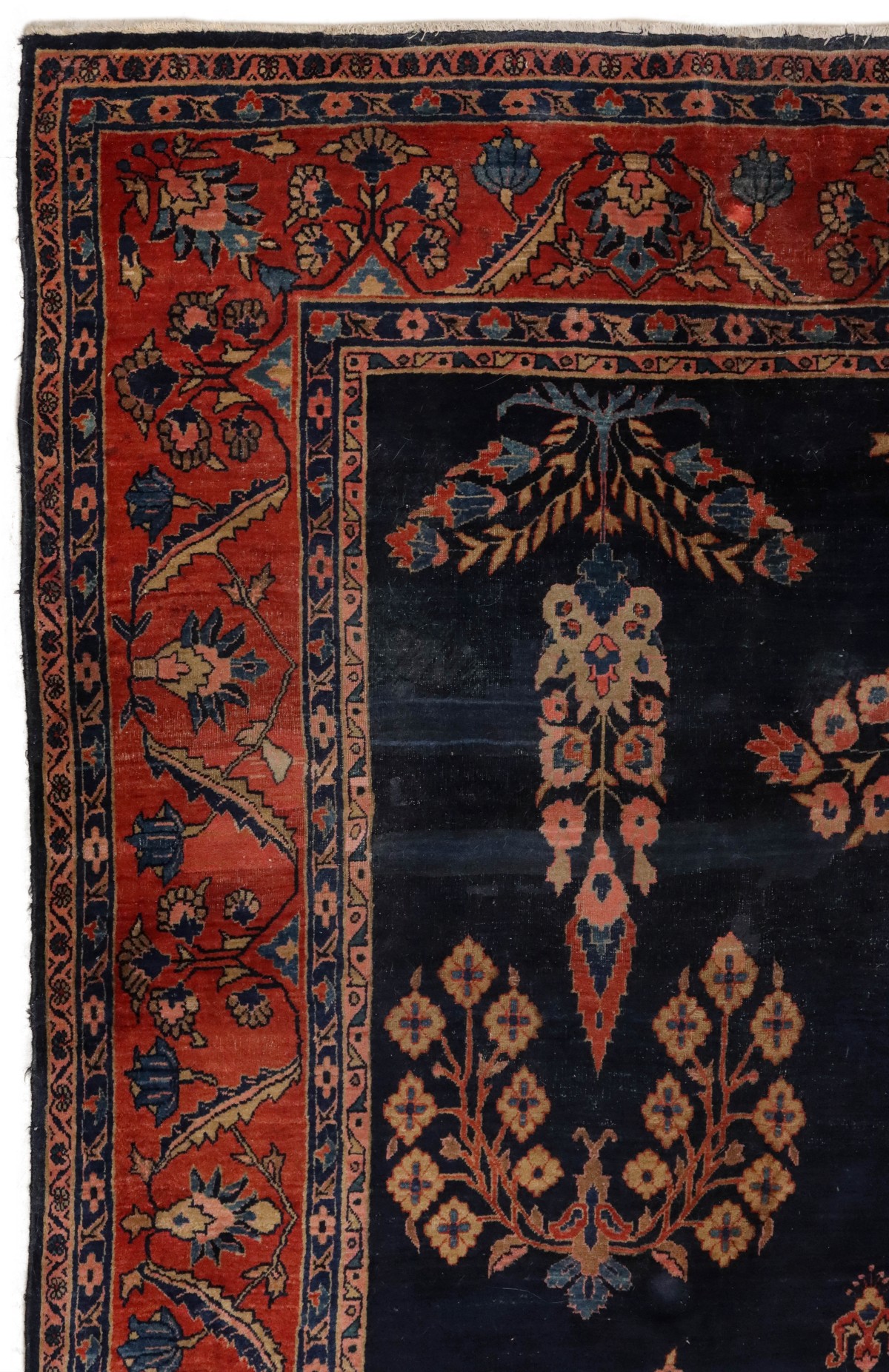 A SPACIOUS JEWEL TONE SAROUK CARPET CIRCA 1910