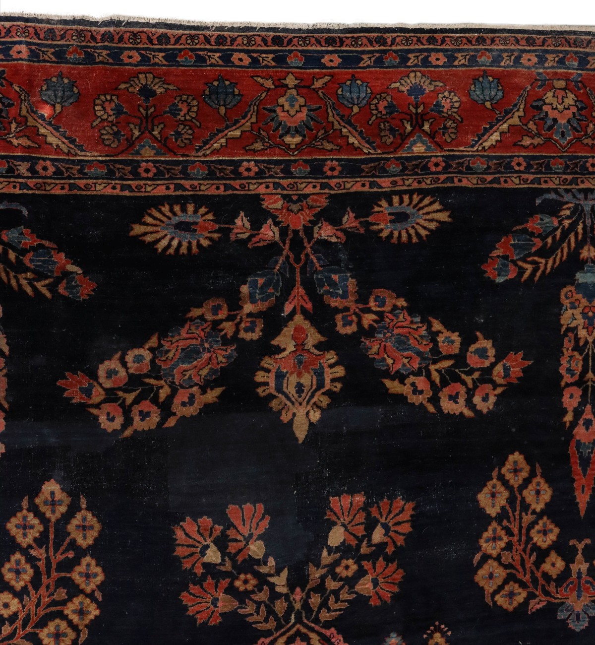 A SPACIOUS JEWEL TONE SAROUK CARPET CIRCA 1910