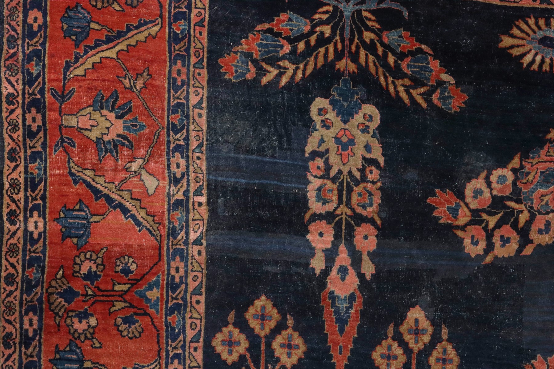 A SPACIOUS JEWEL TONE SAROUK CARPET CIRCA 1910