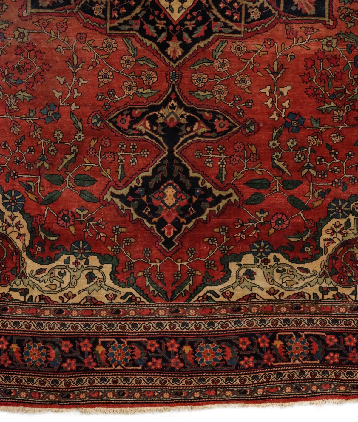 A PERSIAN SAROUK ROOM SIZE RUG WITH MEDALLION CIRCA 1900