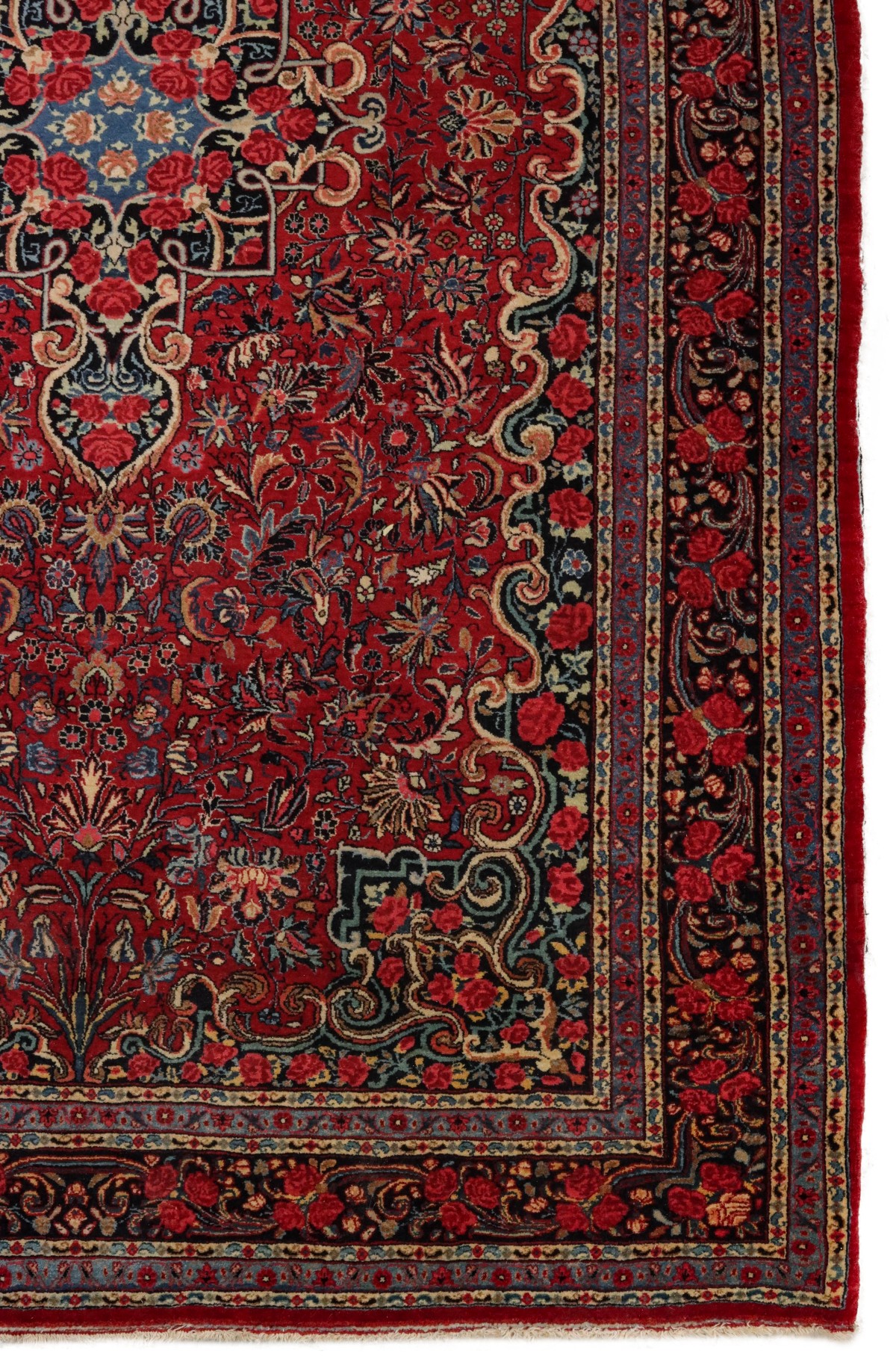 A PERSIAN BIJAR CARPET WITH ROSES CIRCA 1920