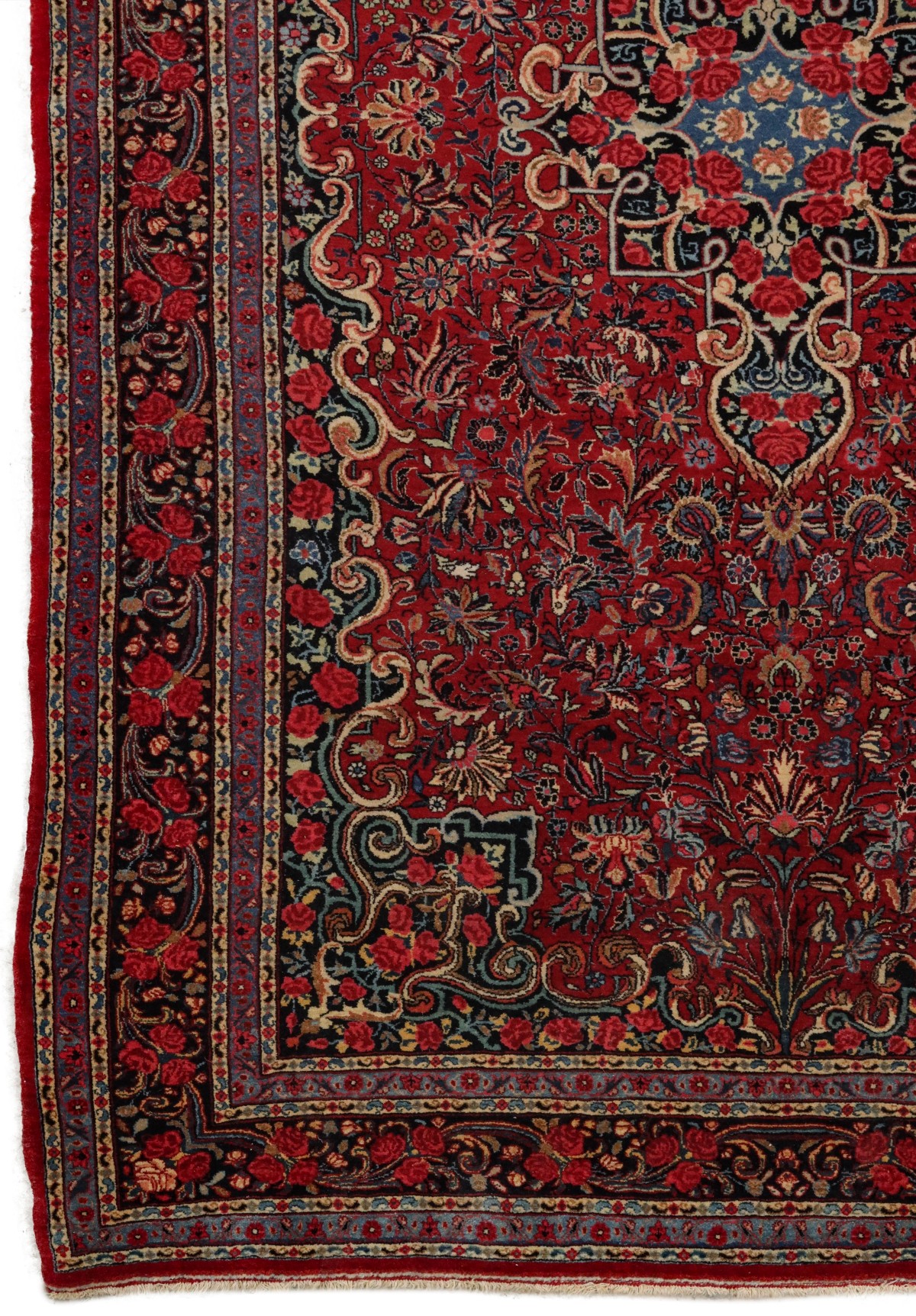 A PERSIAN BIJAR CARPET WITH ROSES CIRCA 1920