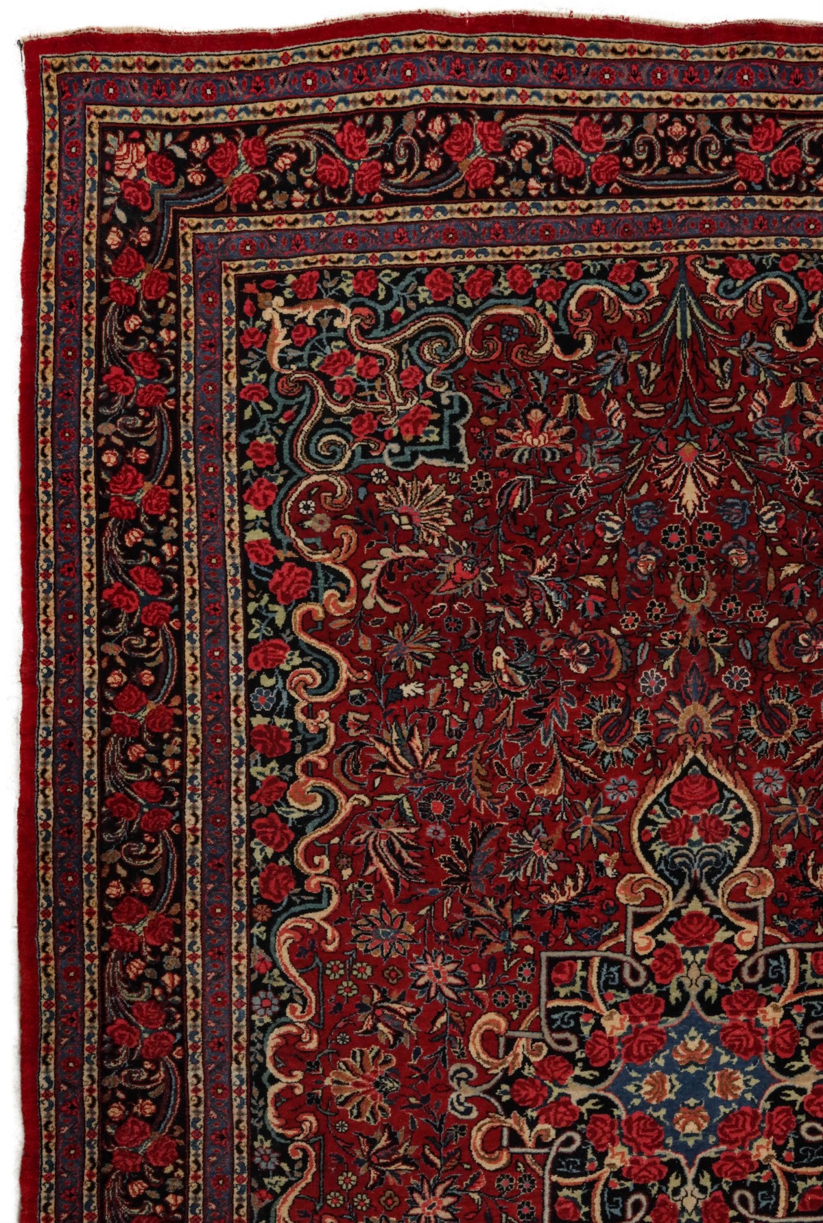 A PERSIAN BIJAR CARPET WITH ROSES CIRCA 1920