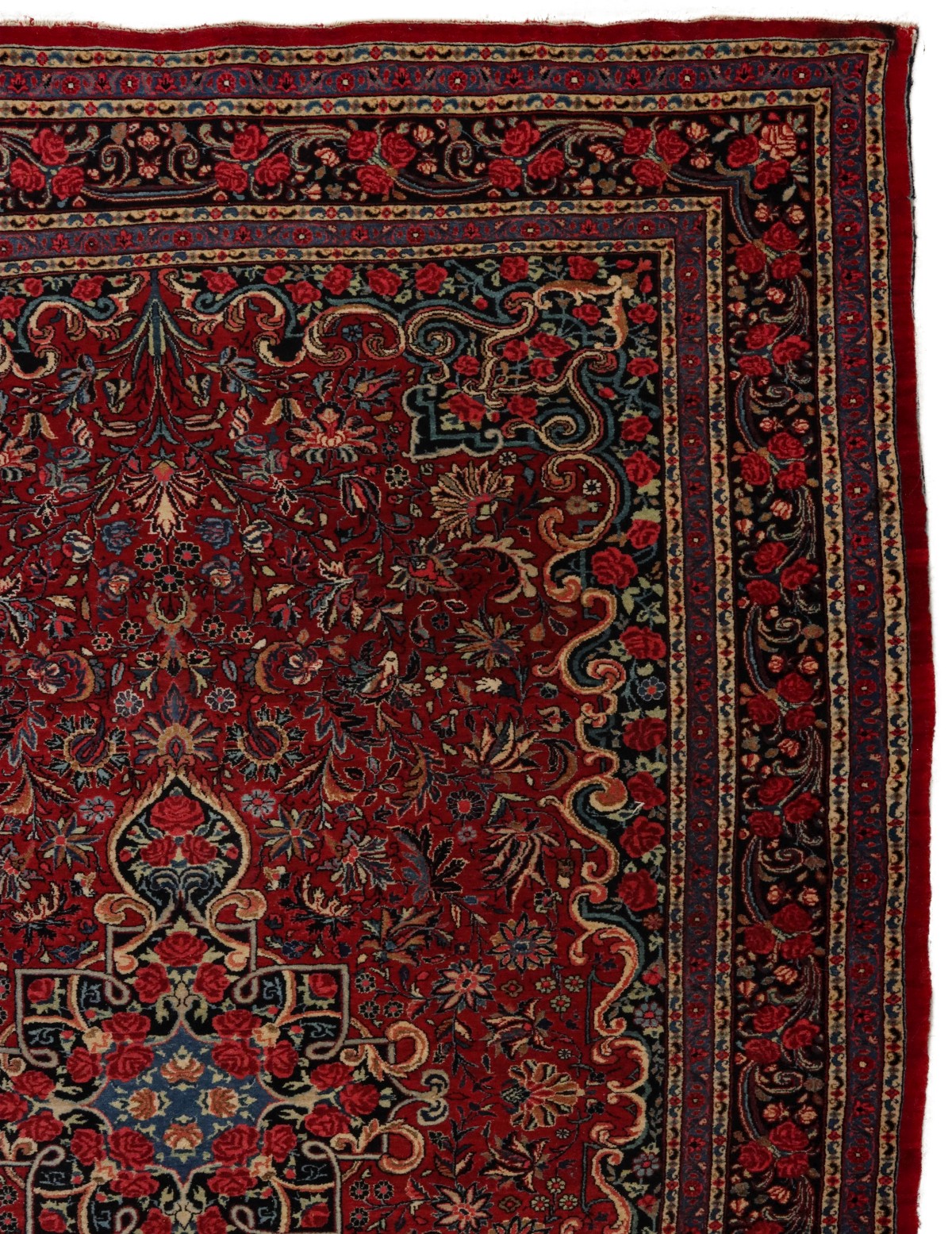 A PERSIAN BIJAR CARPET WITH ROSES CIRCA 1920