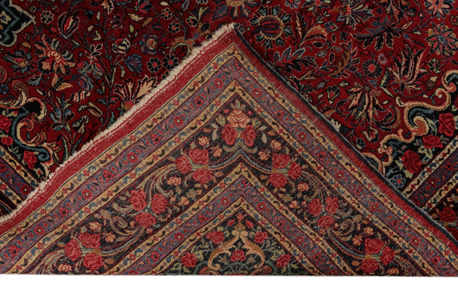 A PERSIAN BIJAR CARPET WITH ROSES CIRCA 1920