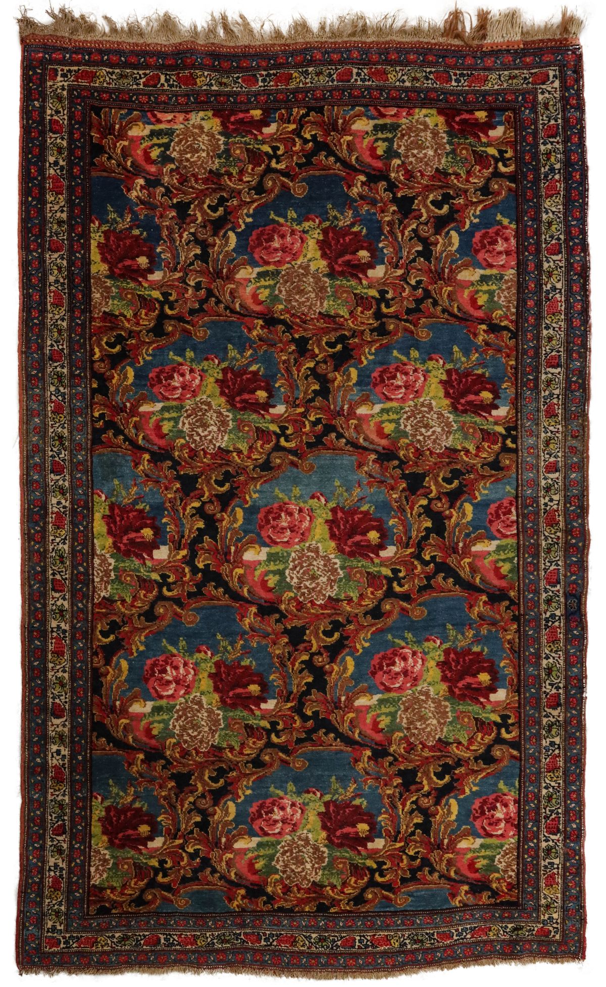 A PERSIAN BIJAR CARPET WITH FLORAL SPRAYS CIRCA 1900