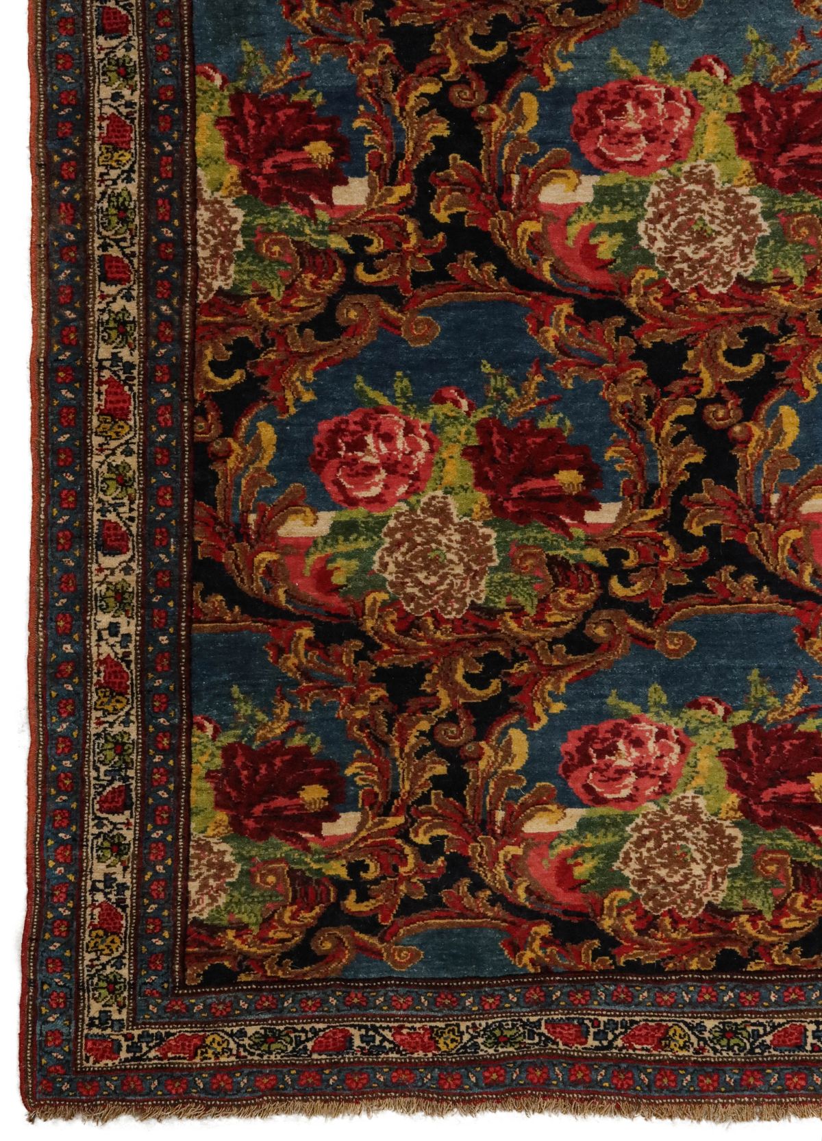 A PERSIAN BIJAR CARPET WITH FLORAL SPRAYS CIRCA 1900