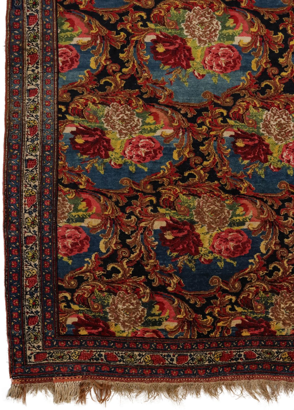 A PERSIAN BIJAR CARPET WITH FLORAL SPRAYS CIRCA 1900