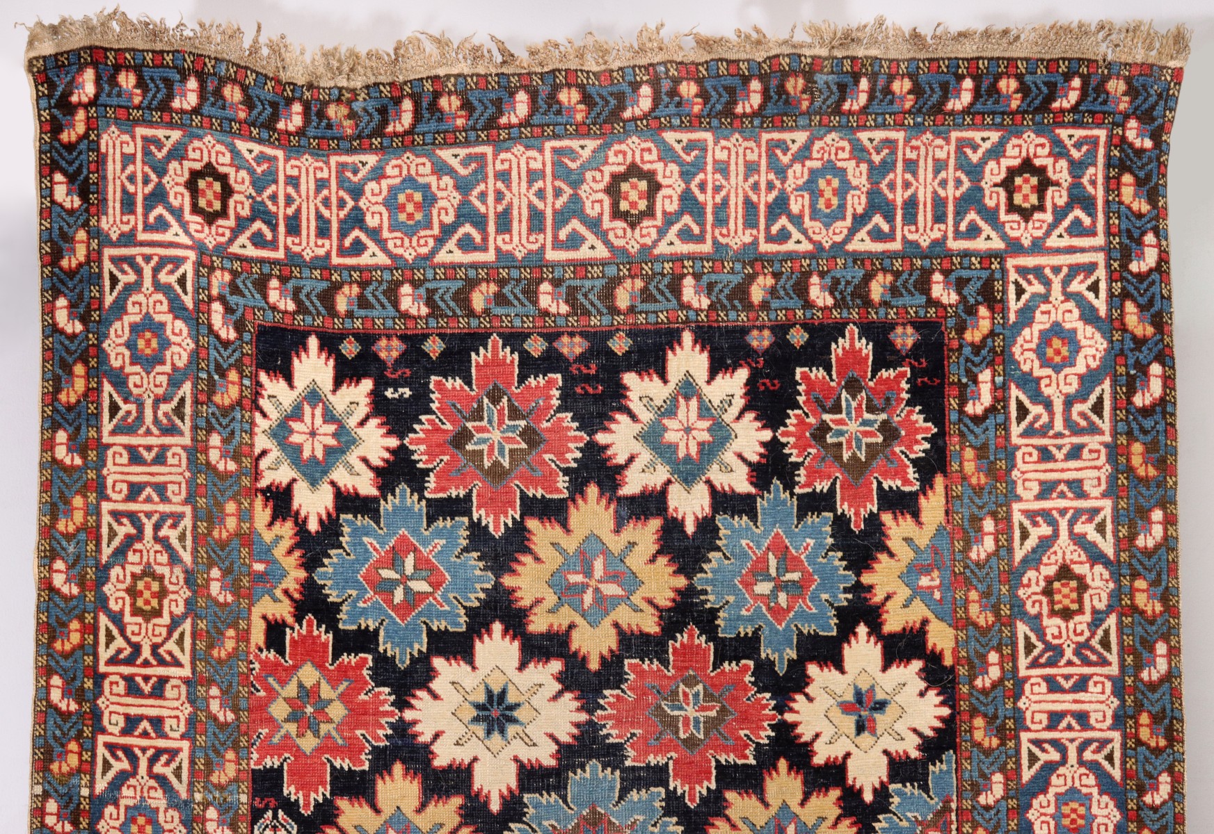 A FINE ANTIQUE NORTHEAST CAUCASUS KUBA RUNNER RUG