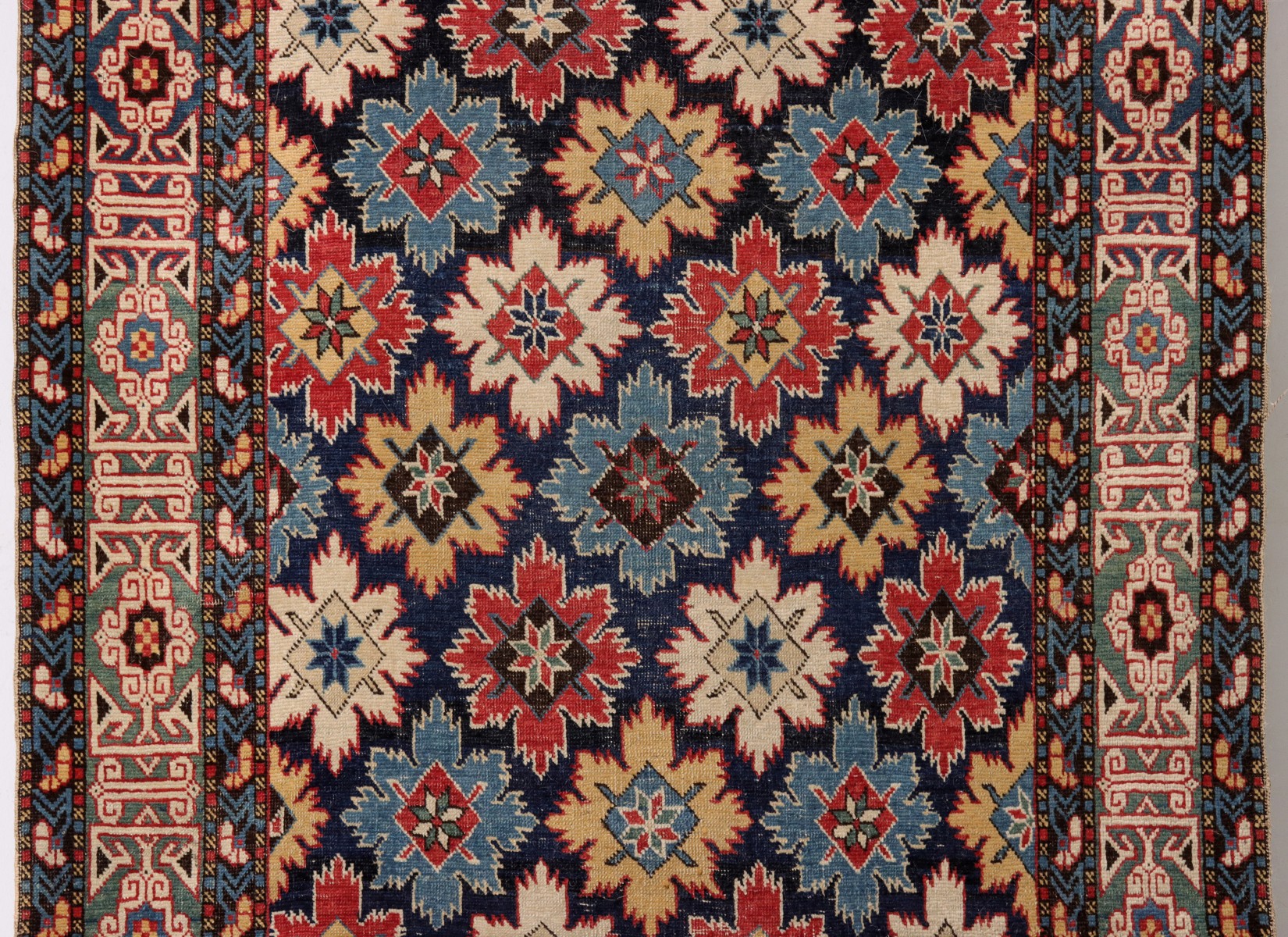 A FINE ANTIQUE NORTHEAST CAUCASUS KUBA RUNNER RUG