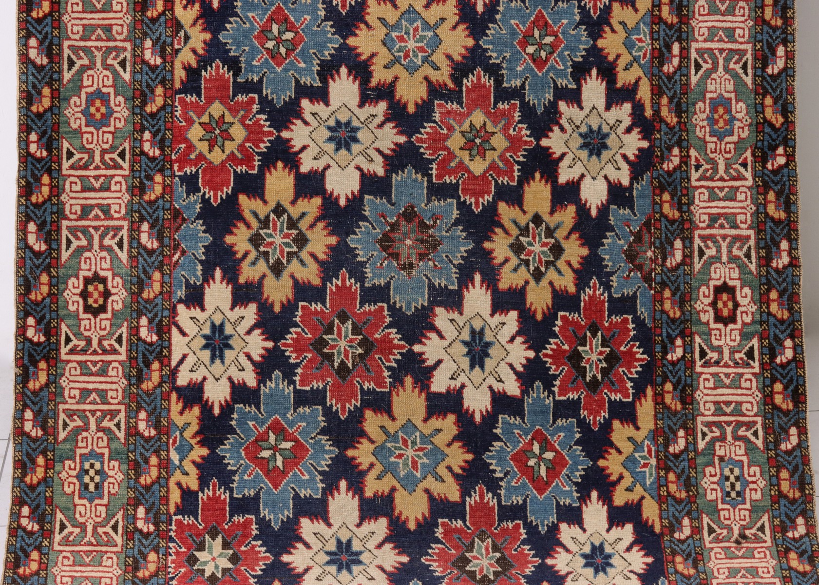 A FINE ANTIQUE NORTHEAST CAUCASUS KUBA RUNNER RUG