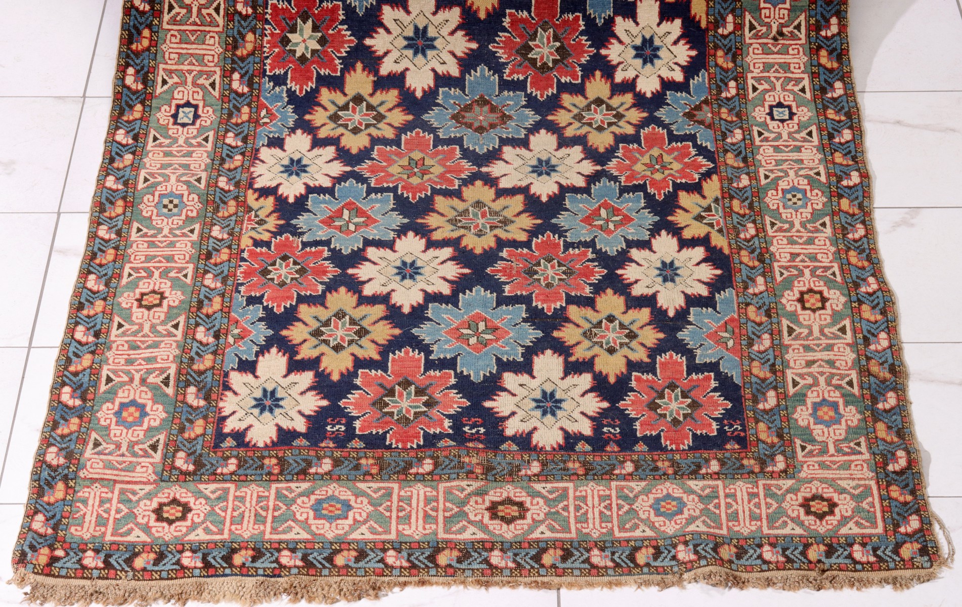 A FINE ANTIQUE NORTHEAST CAUCASUS KUBA RUNNER RUG