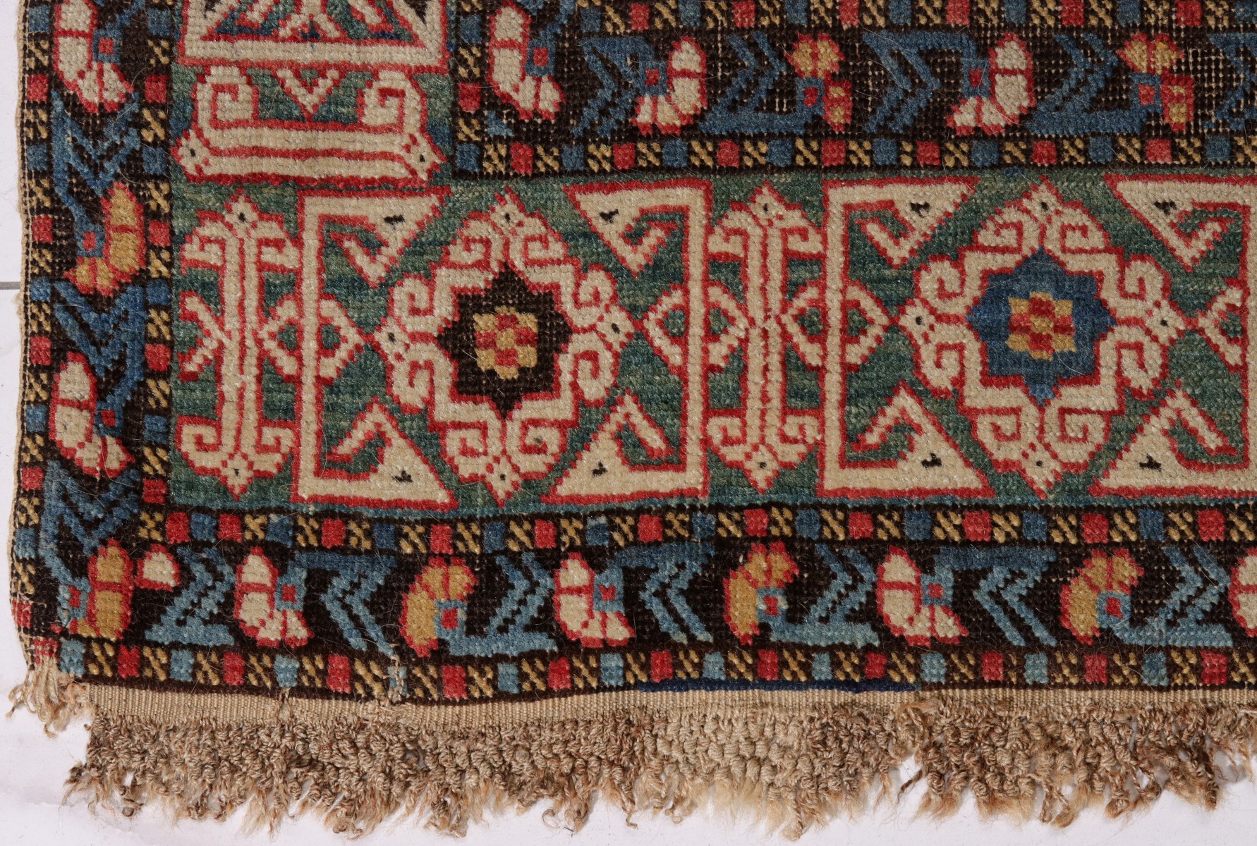 A FINE ANTIQUE NORTHEAST CAUCASUS KUBA RUNNER RUG