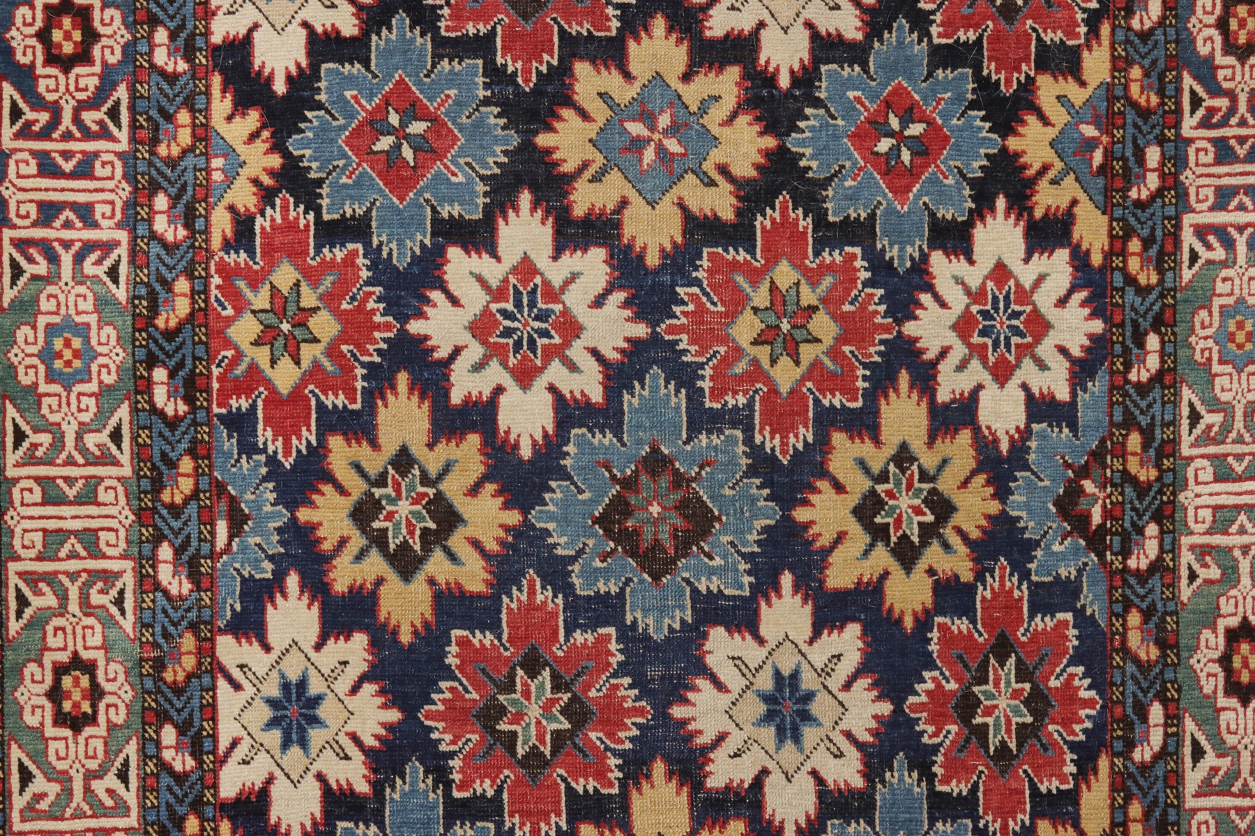 A FINE ANTIQUE NORTHEAST CAUCASUS KUBA RUNNER RUG