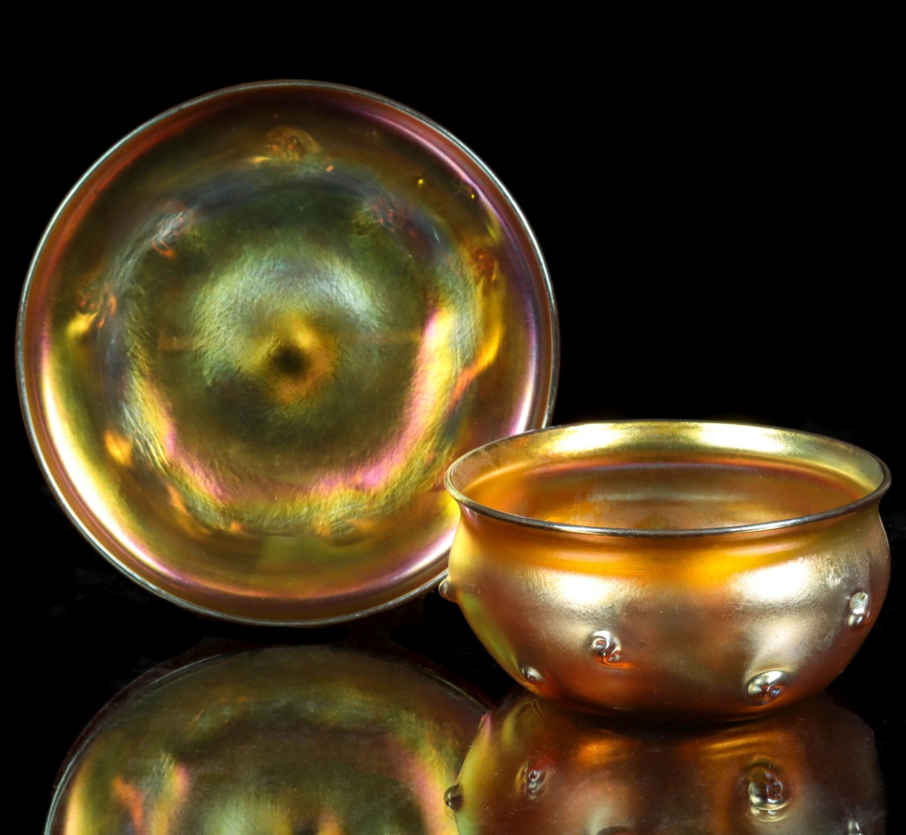 A TIFFANY FAVRILE ART GLASS FINGER BOWL AND UNDERPLATE