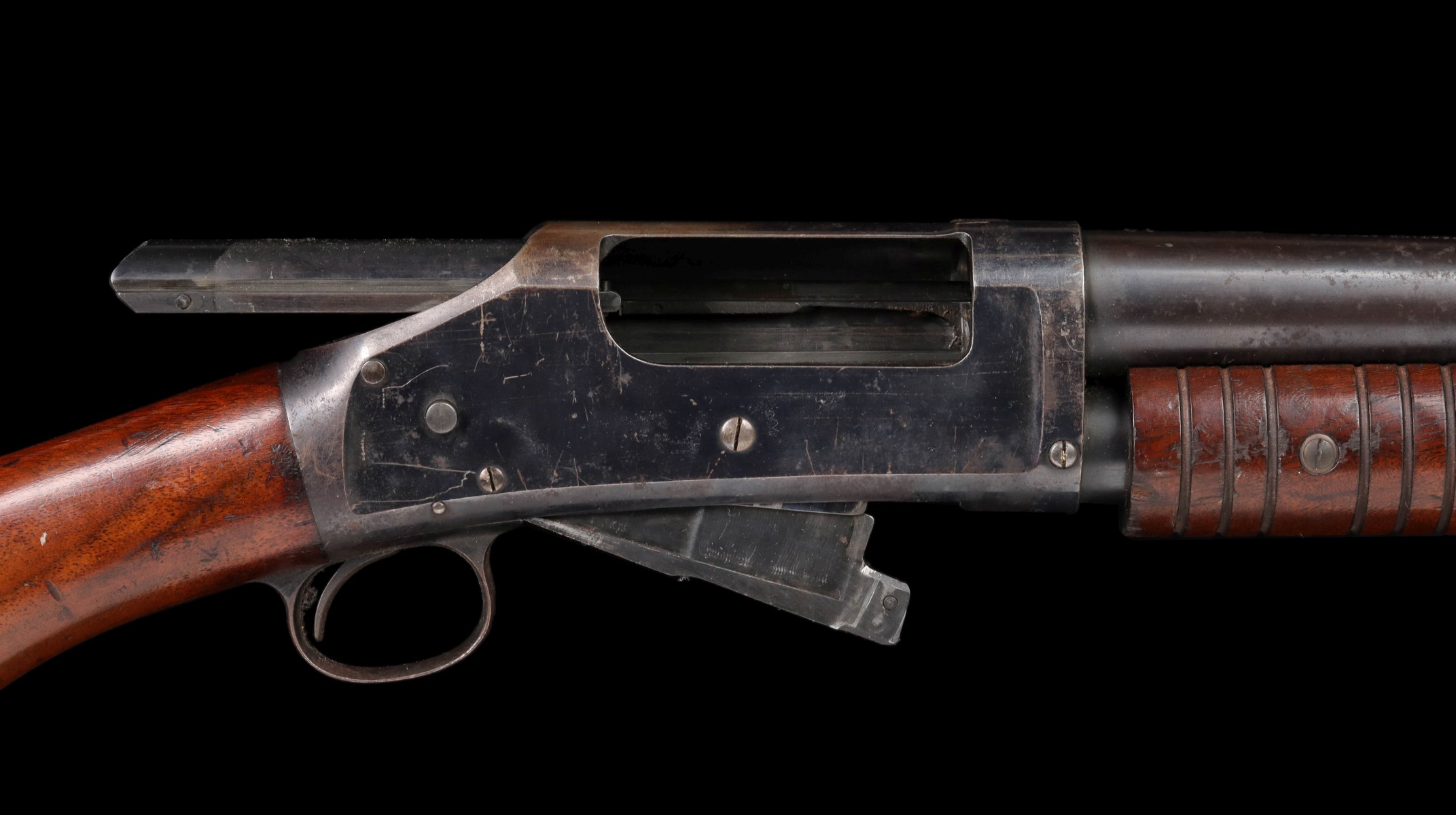 A WINCHESTER 12 GAUGE MODEL 1897 RIOT SHOTGUN