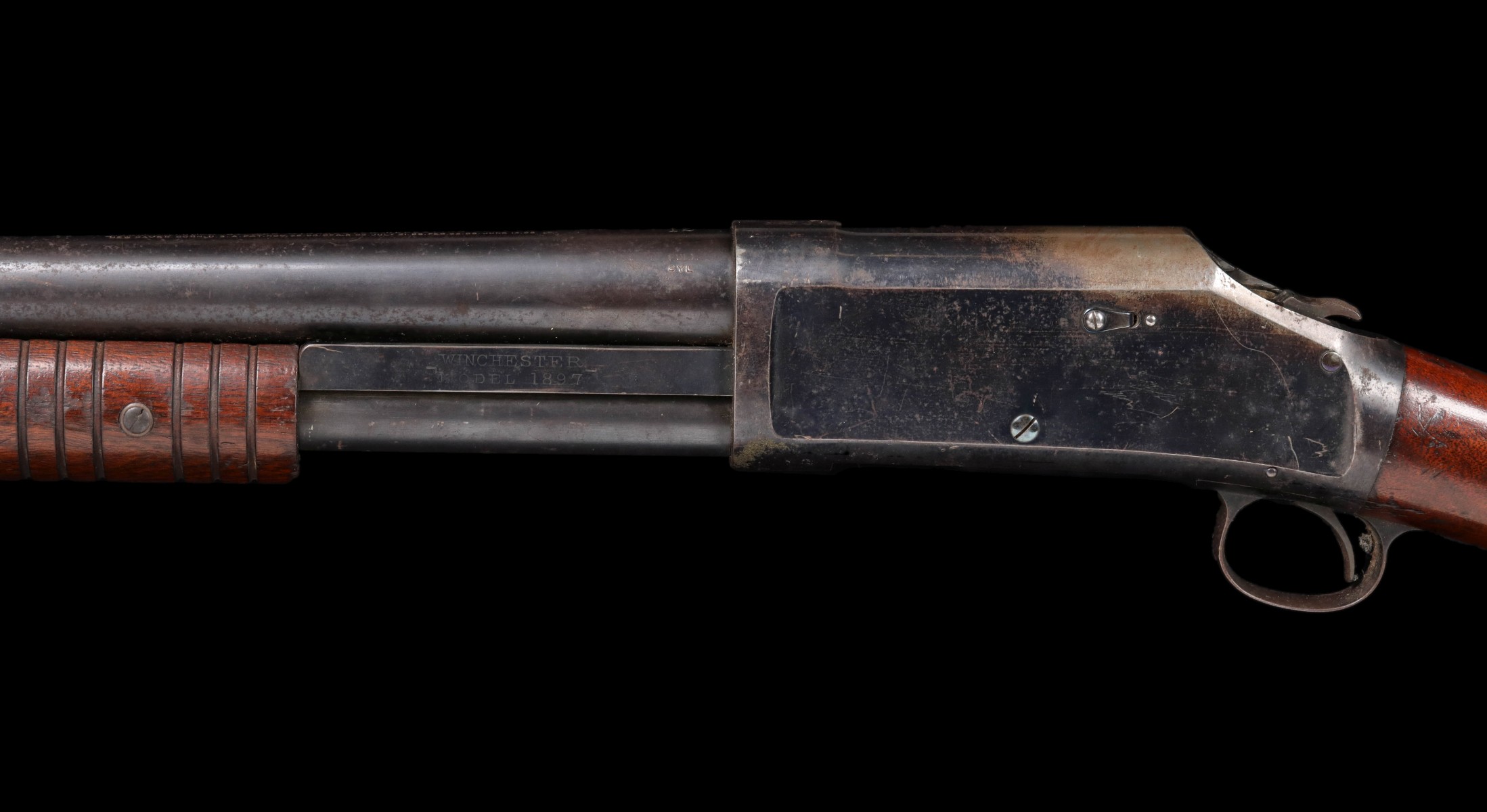 A WINCHESTER 12 GAUGE MODEL 1897 RIOT SHOTGUN