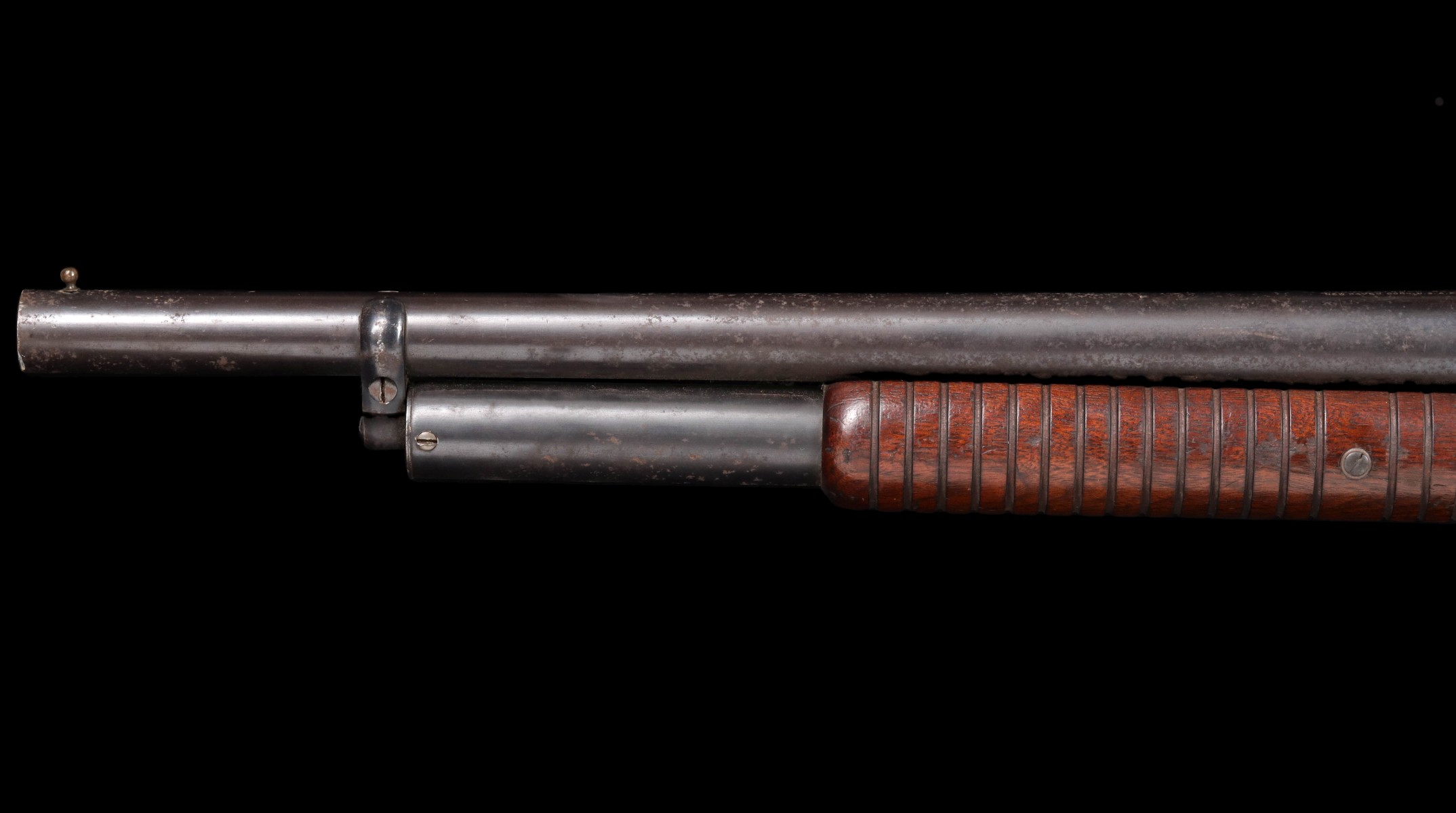 A WINCHESTER 12 GAUGE MODEL 1897 RIOT SHOTGUN