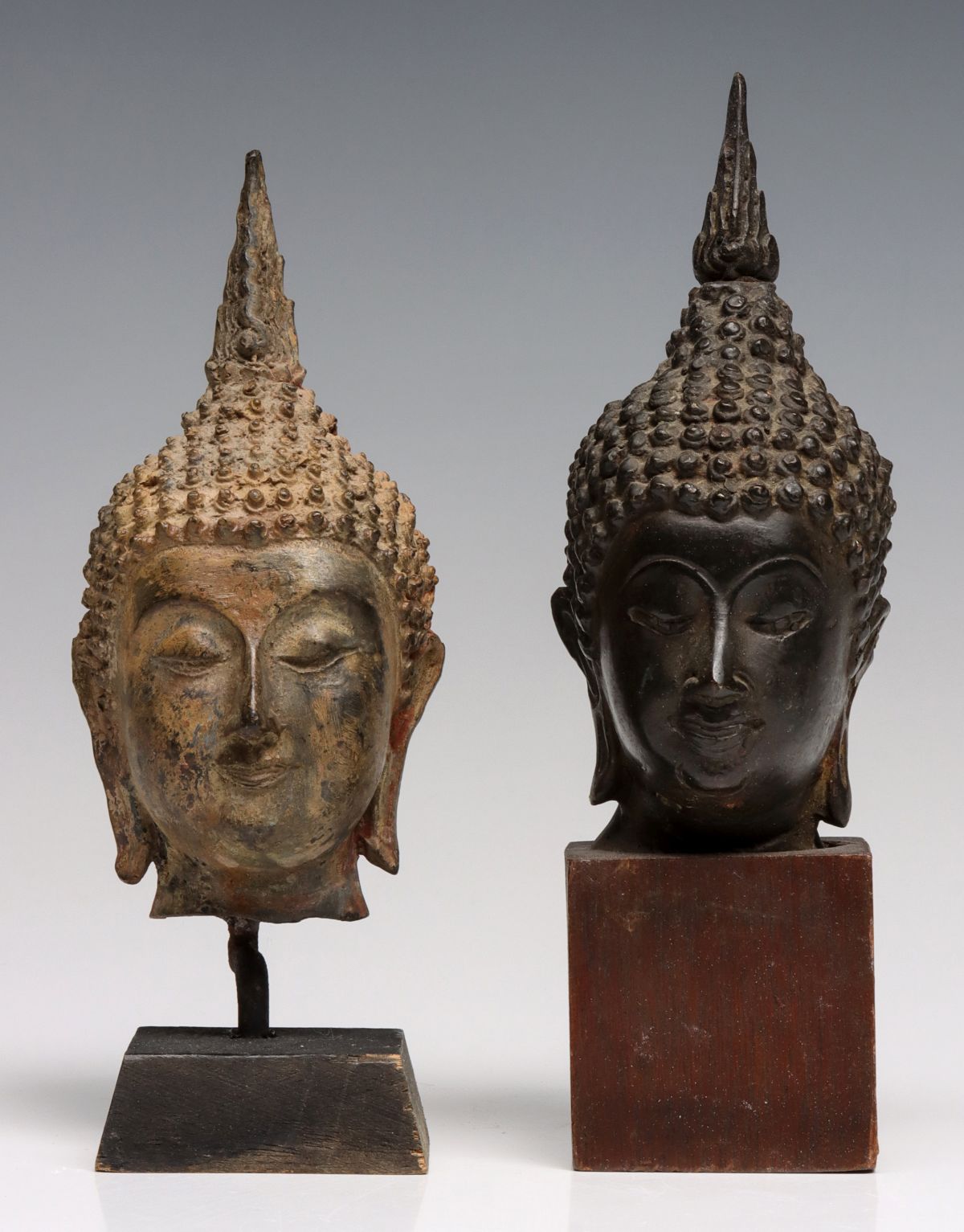 BRONZE HEAD OF BUDDHA AND TIBETAN BRASS FIGURES