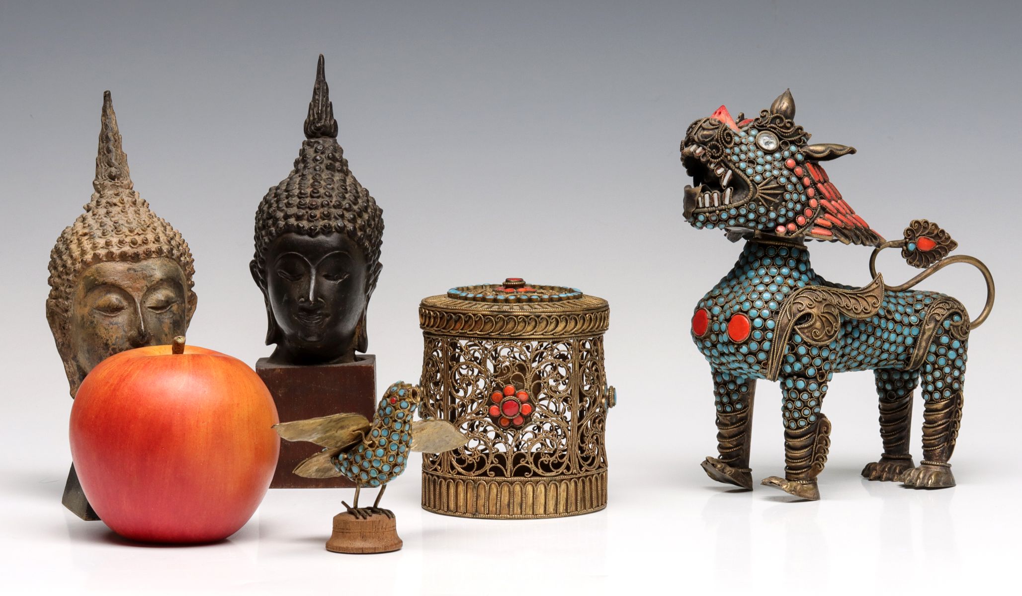 BRONZE HEAD OF BUDDHA AND TIBETAN BRASS FIGURES