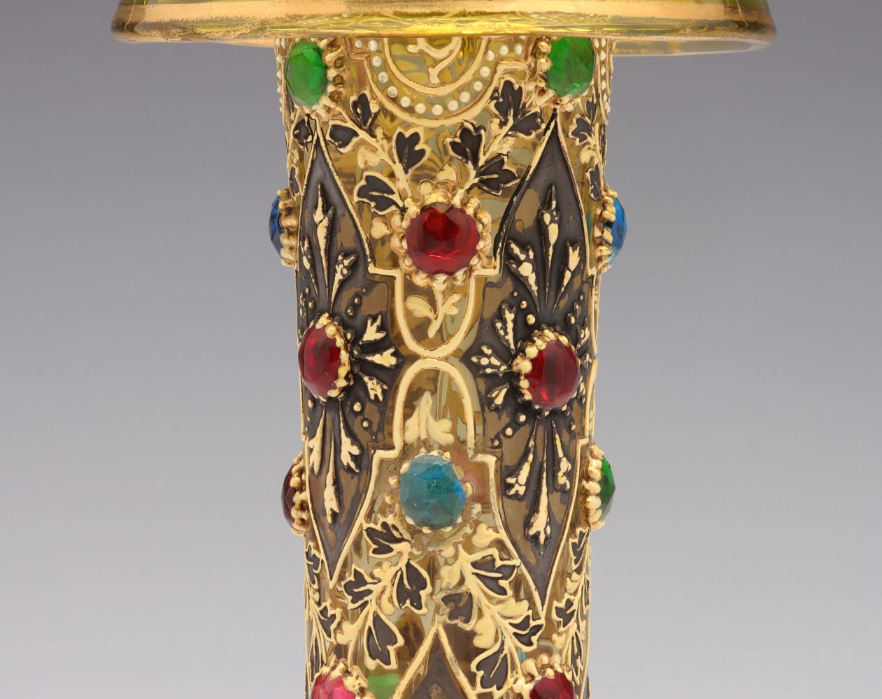 A JEWELED MOSER VASE WITH ROLLED RIM AND MUGHAL DESIGNS