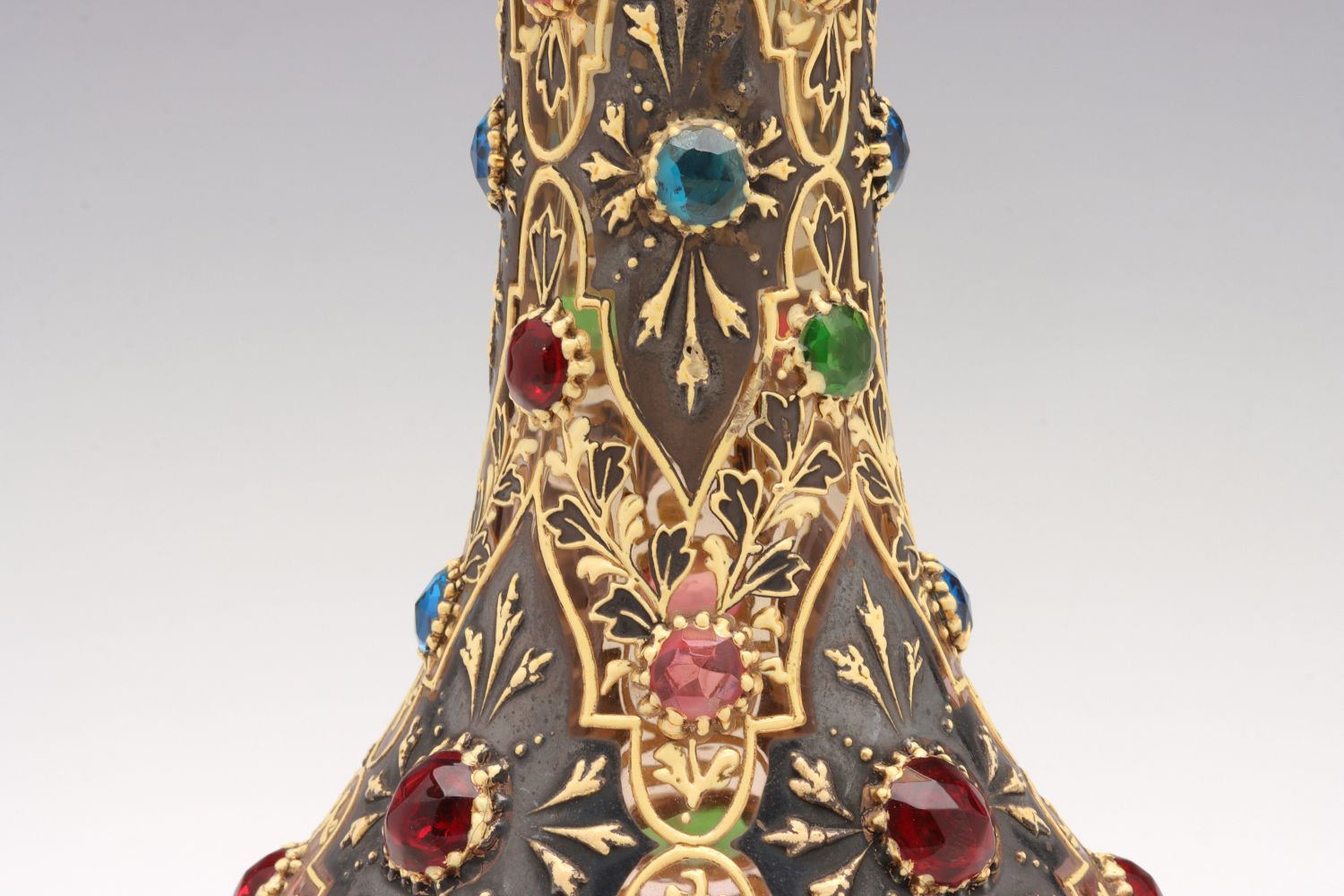 A JEWELED MOSER VASE WITH ROLLED RIM AND MUGHAL DESIGNS