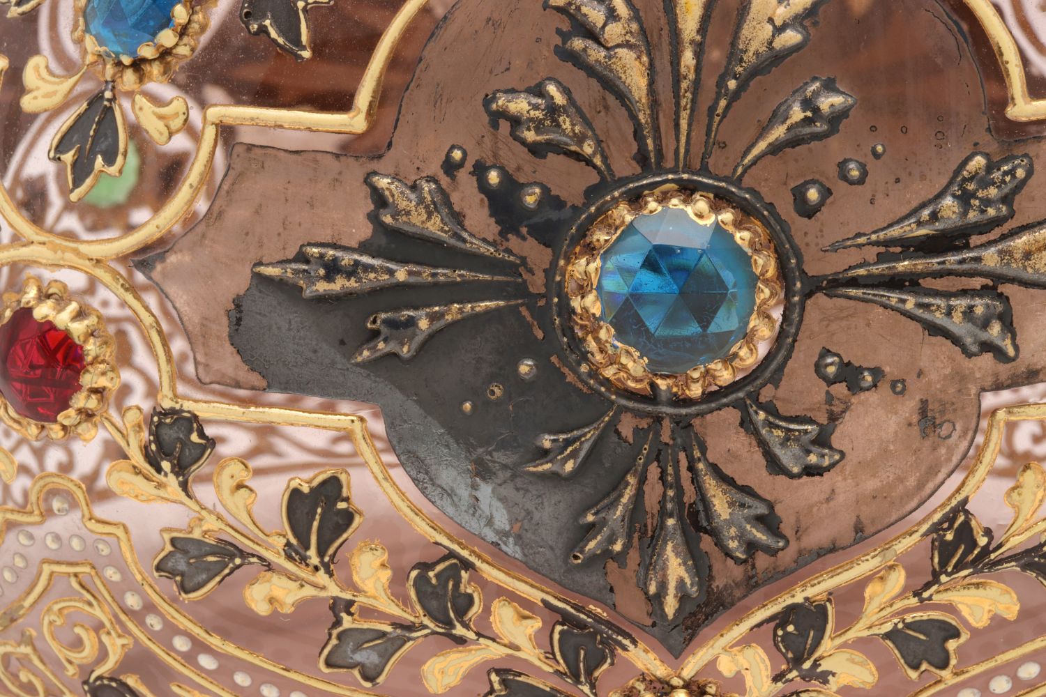A JEWELED MOSER VASE WITH ROLLED RIM AND MUGHAL DESIGNS