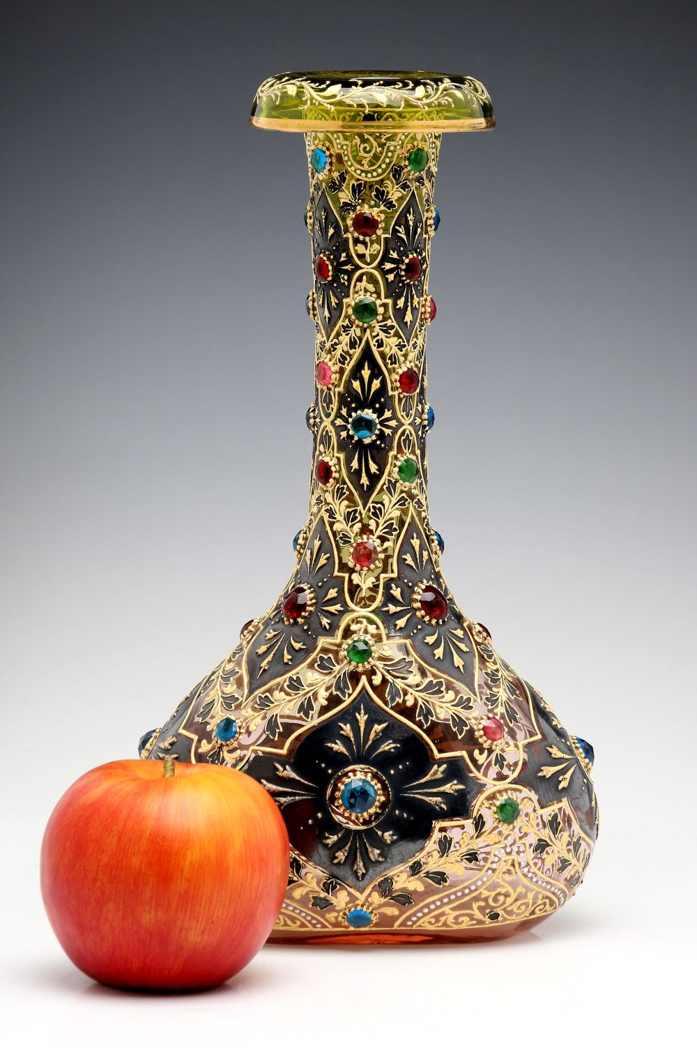 A JEWELED MOSER VASE WITH ROLLED RIM AND MUGHAL DESIGNS