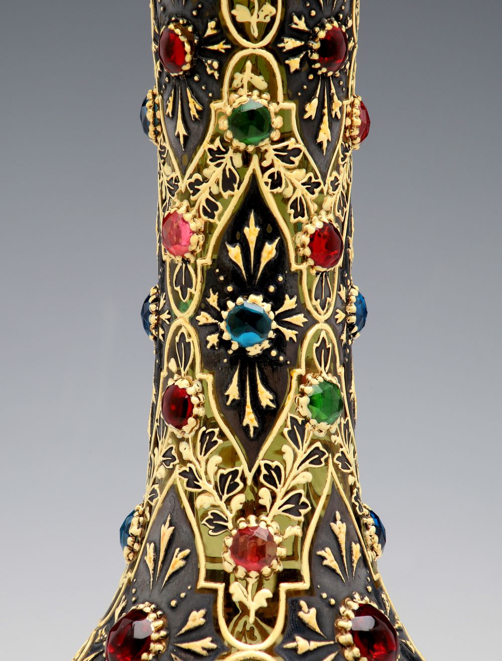 A JEWELED MOSER VASE WITH ROLLED RIM AND MUGHAL DESIGNS