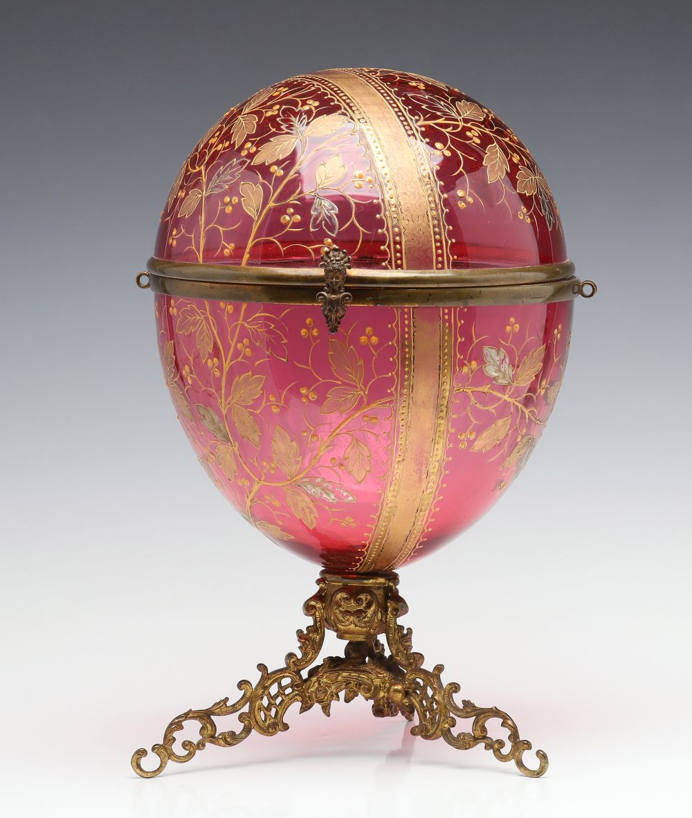 A MOSER GILT AND ENAMELED CRANBERRY GLASS TANTALUS